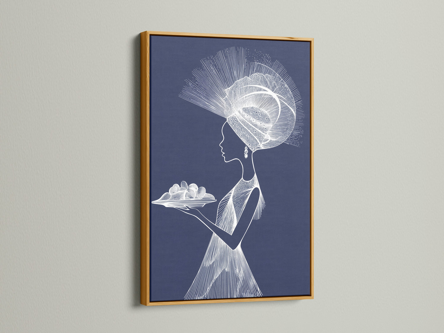 A gold frame showcases this stunning artwork. The art piece illustrates a woman in profile. She is wearing a beautifully detailed headdress. The gold frame adds a touch of luxury and elegance. The frame enhances the artwork's overall appeal. It brings warmth to any room.
