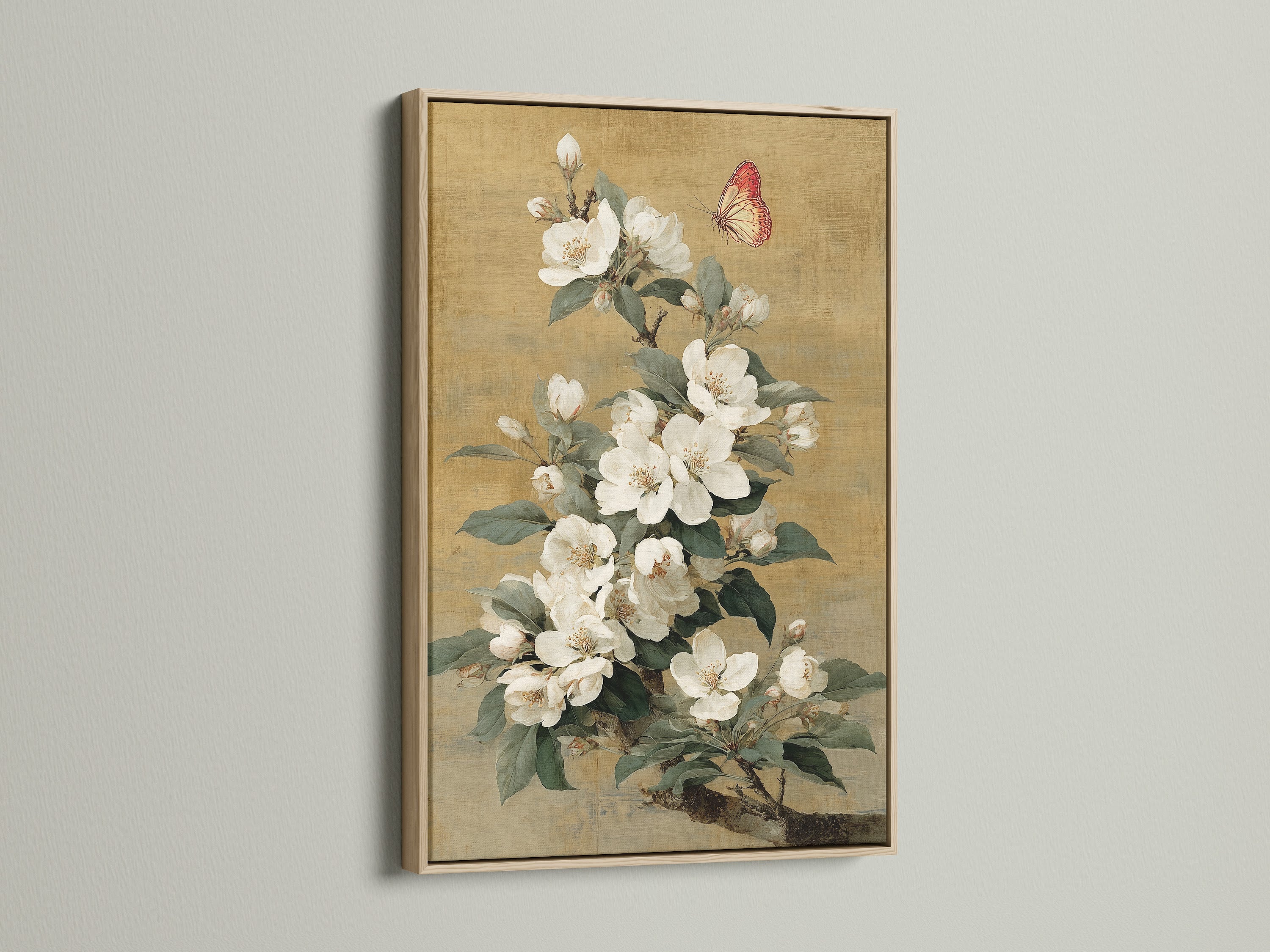 Vintage butterfly print on canvas in an oak frame. The white flower artwork is perfect for adding a touch of nature to your home. This botanical canvas art complements vintage farmhouse traditional or eclectic styles. Shop now for bedroom art and nature wall decor.