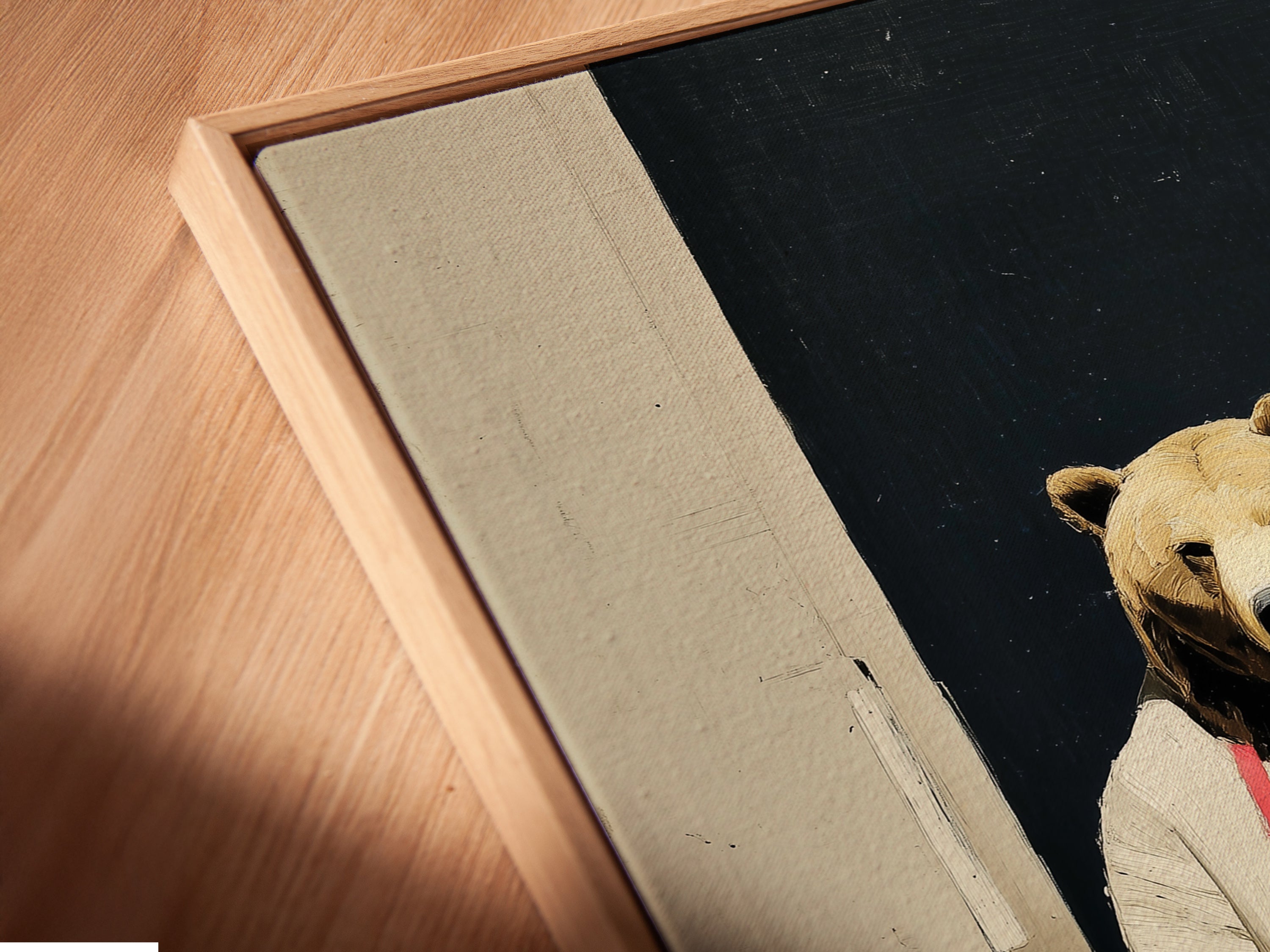 A close-up of the bear baker canvas print in a floating frame. The floating frame adds depth and dimension. The whimsical artwork is perfect for kitchens and cafes. The artwork brings a modern and stylish touch to any wall.