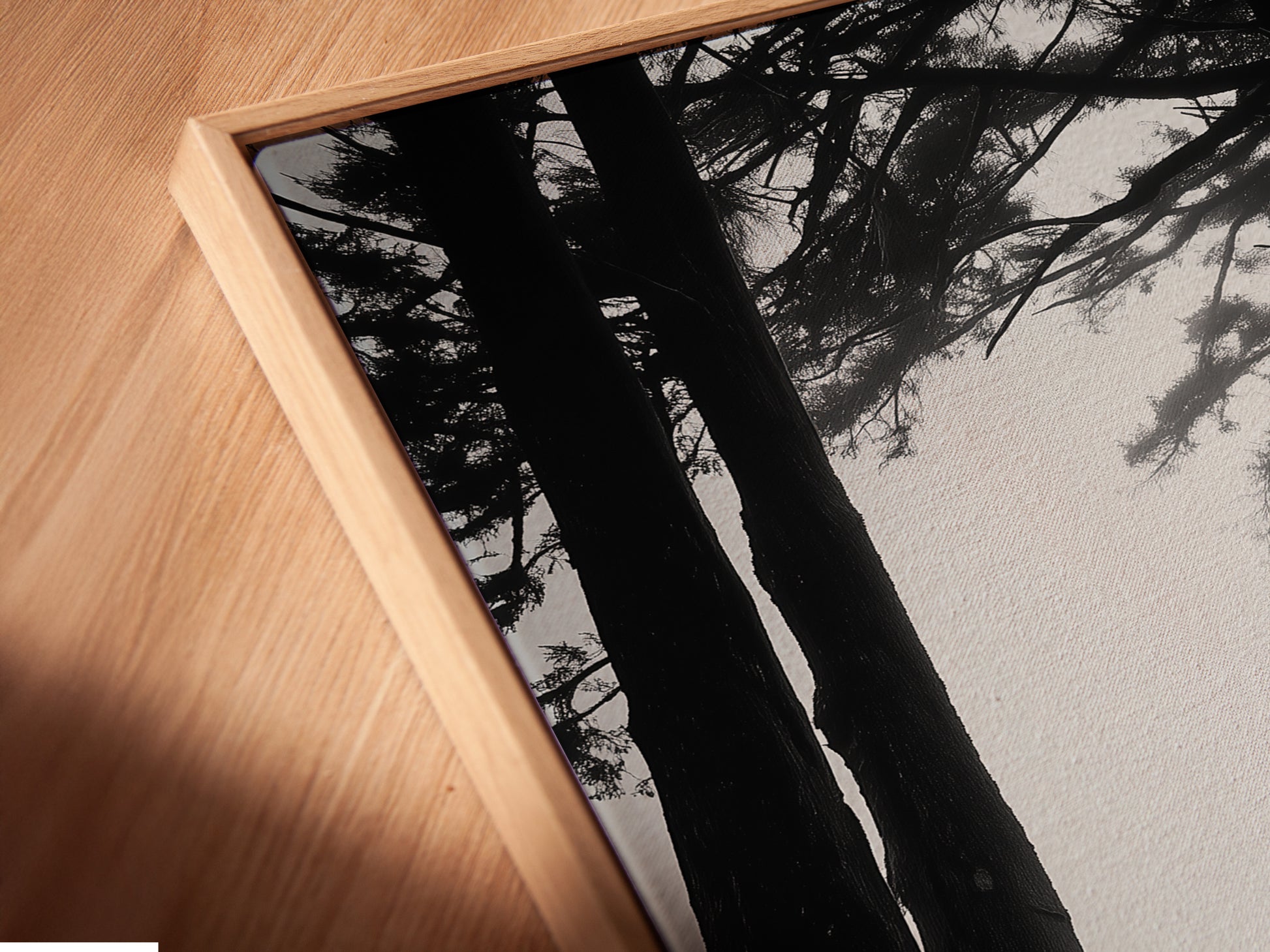 Close-up angled shot of a canvas print in a floating frame. The floating frame gives the artwork a sophisticated look. It separates the canvas from the wall. It enhances the three-dimensional effect. Experience art in a floating frame.