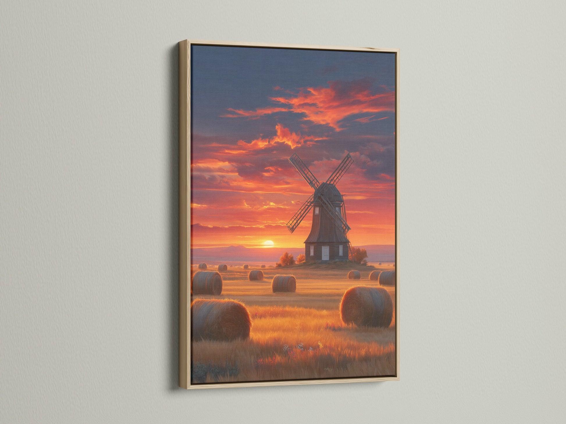 A tranquil sunset canvas print featuring a windmill. It's framed in oak. The artwork captures the essence of the Dutch countryside. Ideal for adding a rustic touch to your decor.