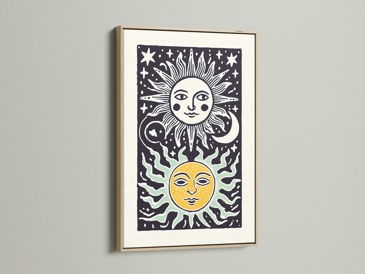 Oak frame showcases sun and moon art beautifully. The frame complements the artwork's style. The art piece includes celestial elements. The artwork is displayed on a white wall. The oak frame enhances the artwork.