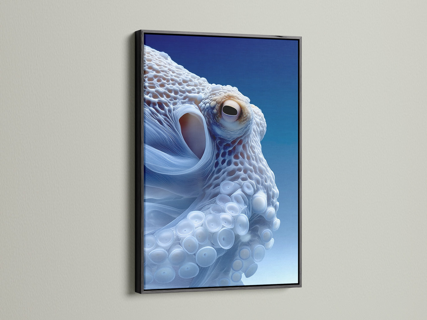 This image features an octopus art print set in a sleek black frame. The dark frame makes the blue of the ocean canvas pop. This coastal artwork adds sophistication to any space. Ideal for modern or minimalist decor. Elevate your home with this marine artwork.