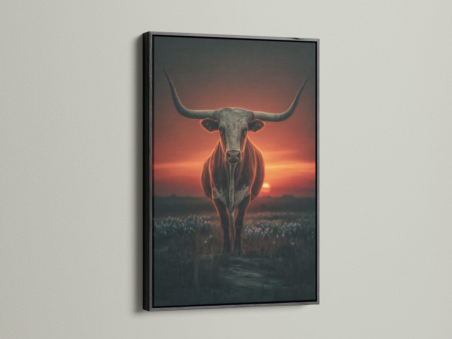 Longhorn bull canvas print in a black frame. This striking western artwork captures a sunset scene. The black frame adds a modern touch to the rustic theme. Ideal for a dramatic statement in your living room. This bull canvas print elevates your decor.