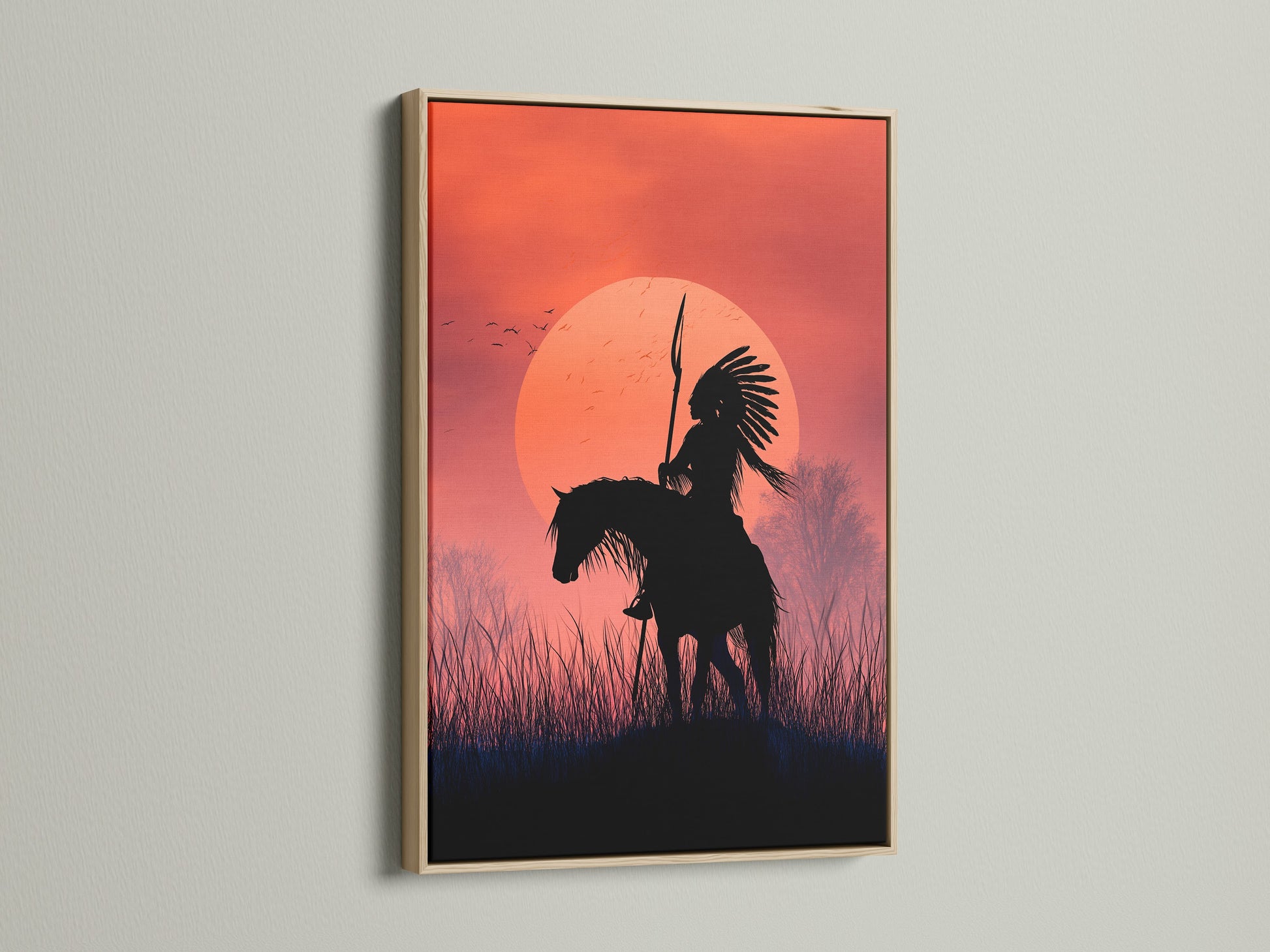 Native American Warrior canvas art in an oak frame. The sunset silhouette creates a stunning visual. Ideal for western wall decor and horseback rider art. This tribal wall art adds a touch of southwestern charm to your home or office.
