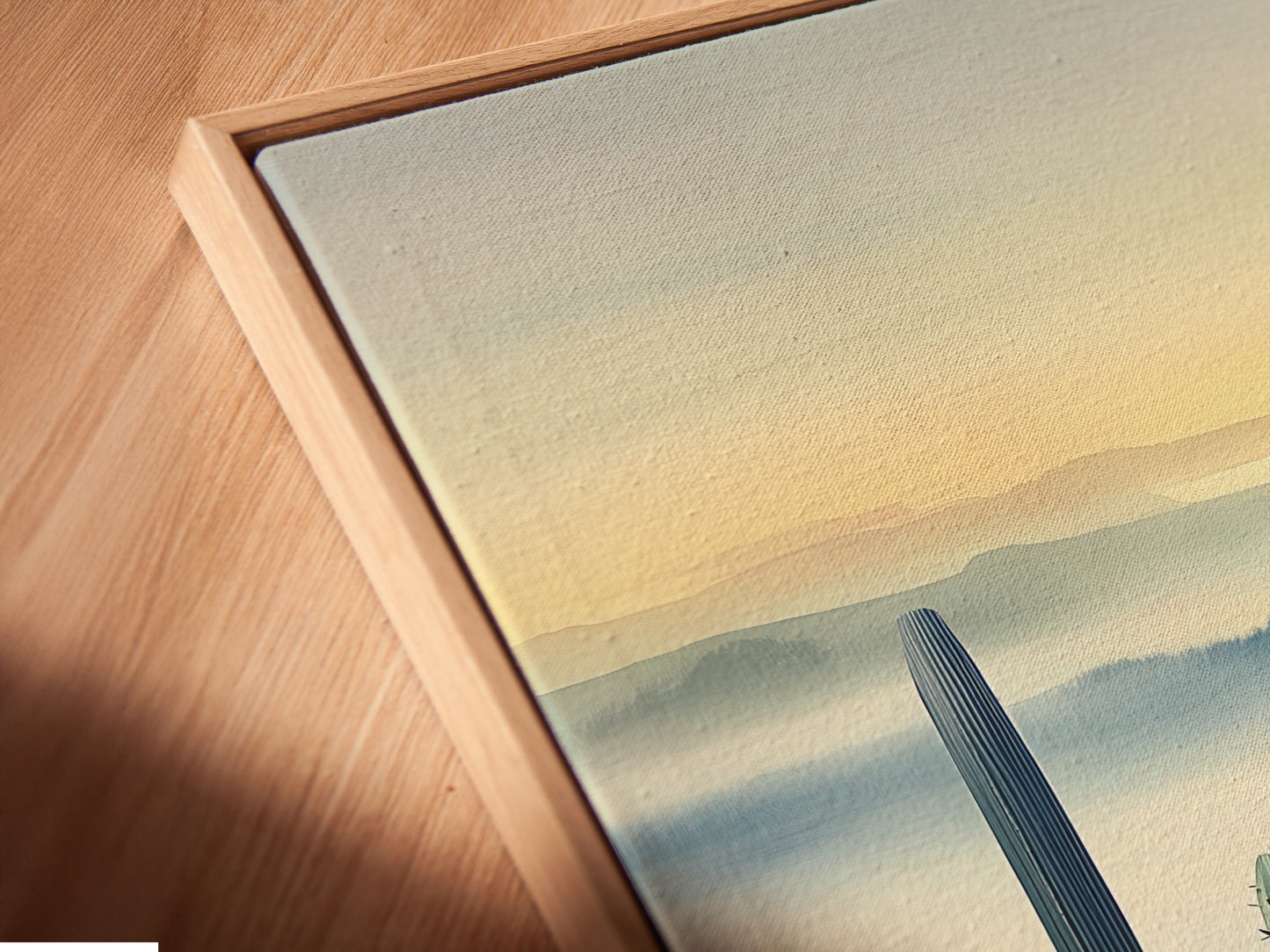 A close-up of the cactus canvas print. The floating frame enhances the artwork. The desert landscape wall art is captivating. The southwest decor adds a modern touch. The blue haze art creates a serene atmosphere.