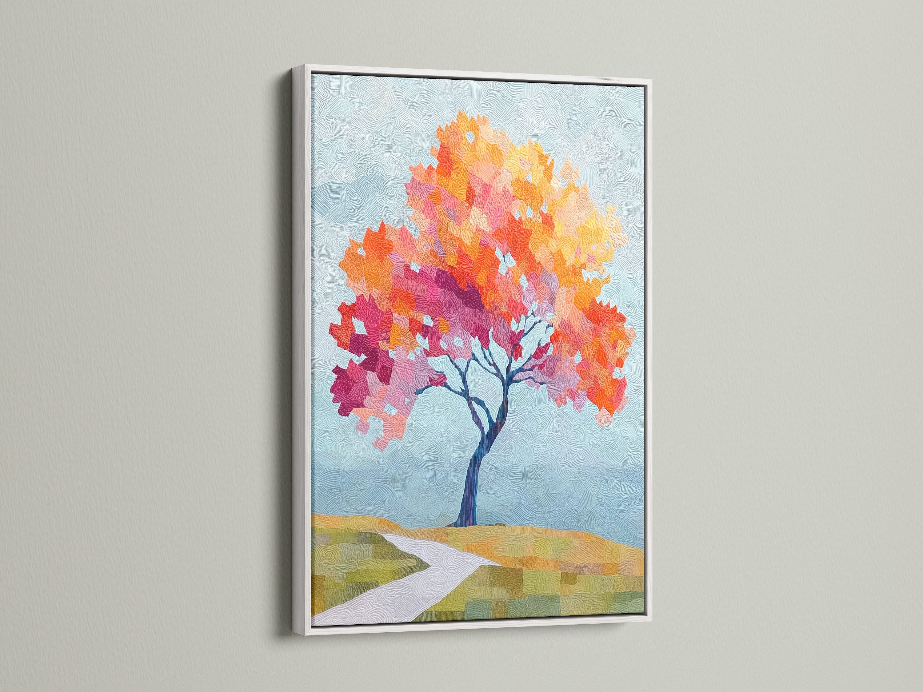White frame displaying the Autumn Tree Canvas Print. This nature canvas art features vibrant fall colors. It is a great choice for seasonal wall decor. The white frame complements minimalist and Scandinavian styles. It is suitable for office wall art.