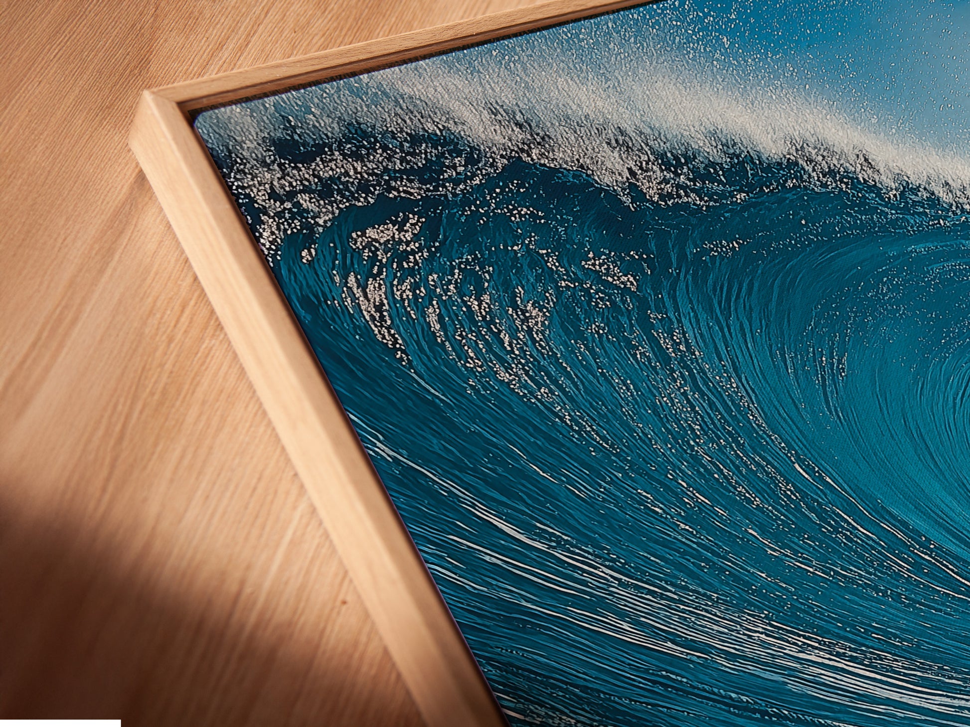 A close-up shows a canvas print in a floating frame. The floating frame gives the art a modern look. The canvas texture enhances the artwork. The print looks great in the floating frame.