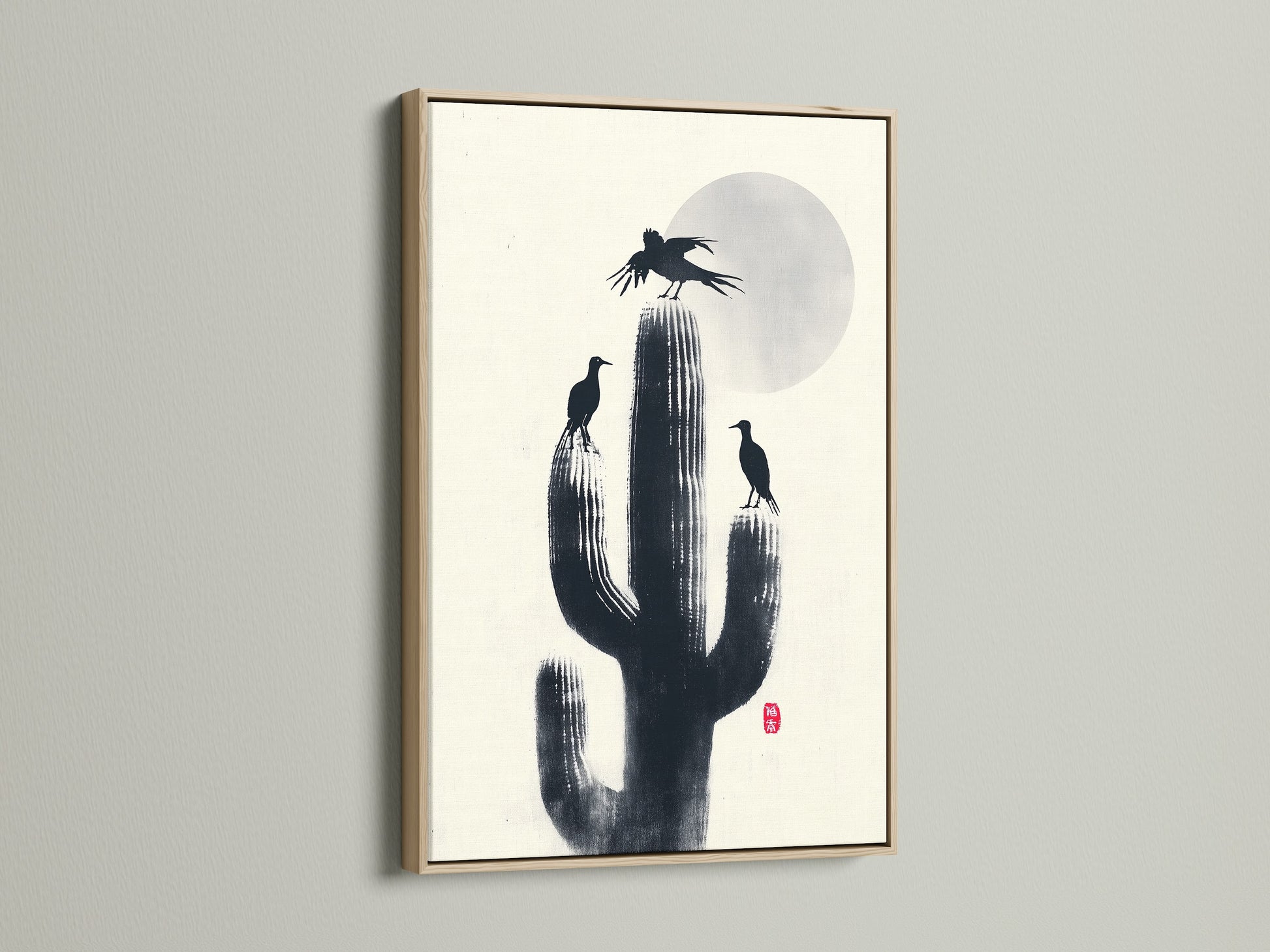 Cactus Birds desert print in an oak frame. Black birds sit atop a cactus against a beige background. Silhouette art brings a southwestern feel. Perfect nature canvas for a study room or living space.