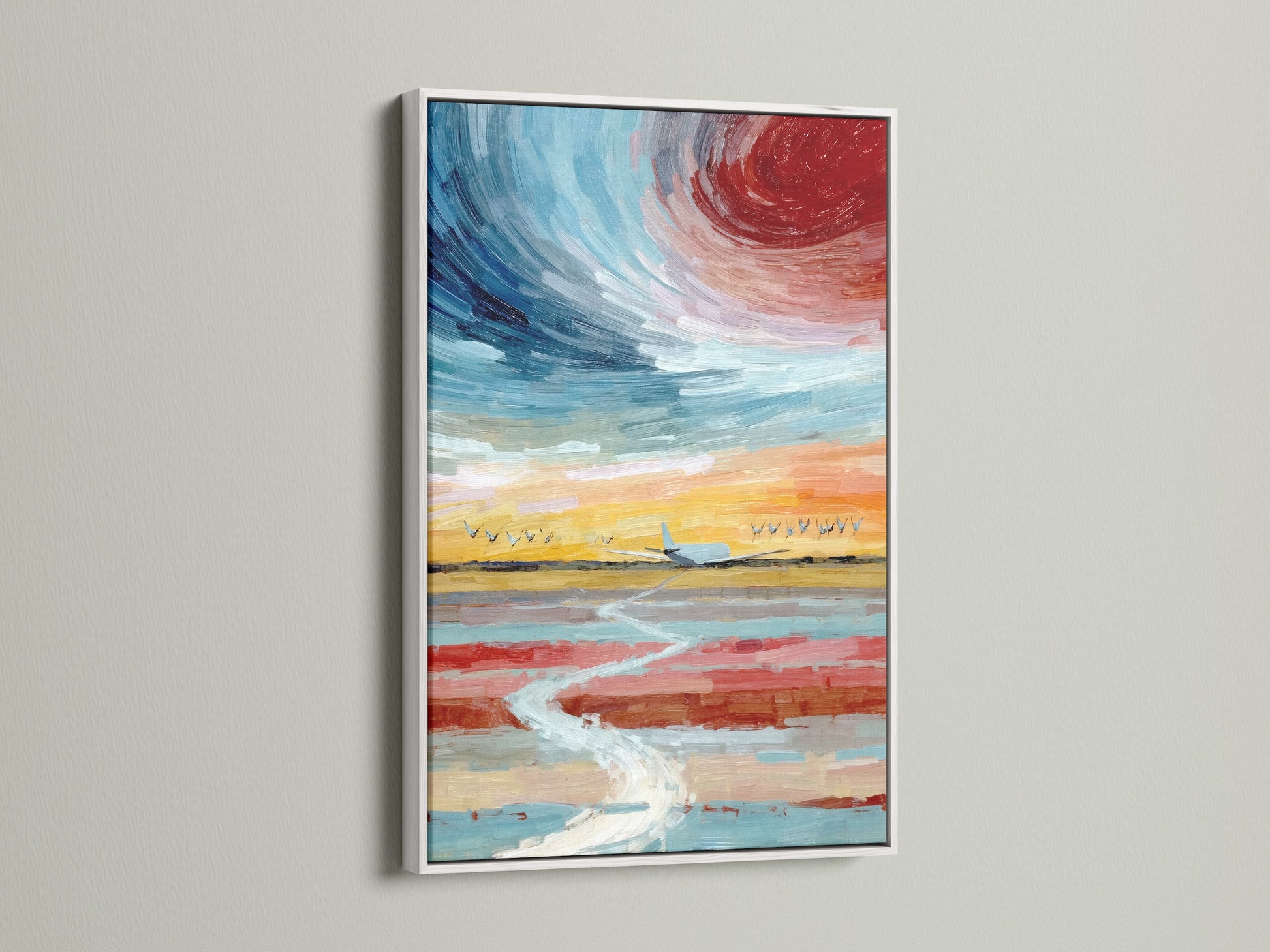 The white frame enhances this sky canvas art print. See how sunset wall art transforms your living room. This modern art print features an airplane flight. The aviation print adds a contemporary touch. Ideal as office wall decor or an aviation gift.