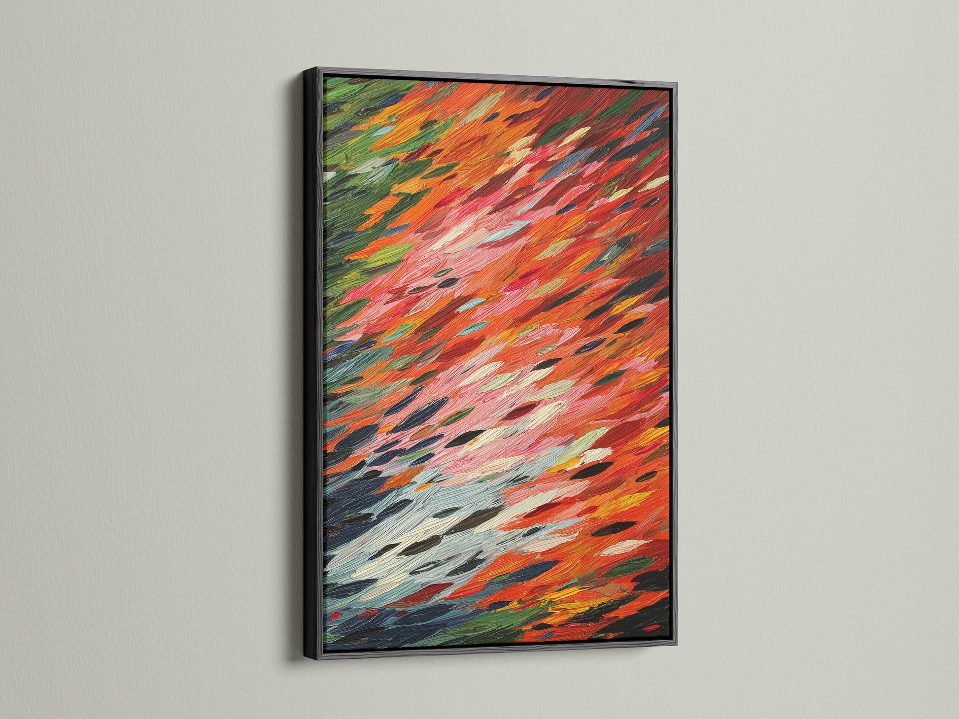 This image features an abstract brushstroke artwork in a sleek black frame. The contrast between the colorful orange and red artwork and the black frame is striking. It is a bold choice for modern wall decor and adds sophistication to any space.