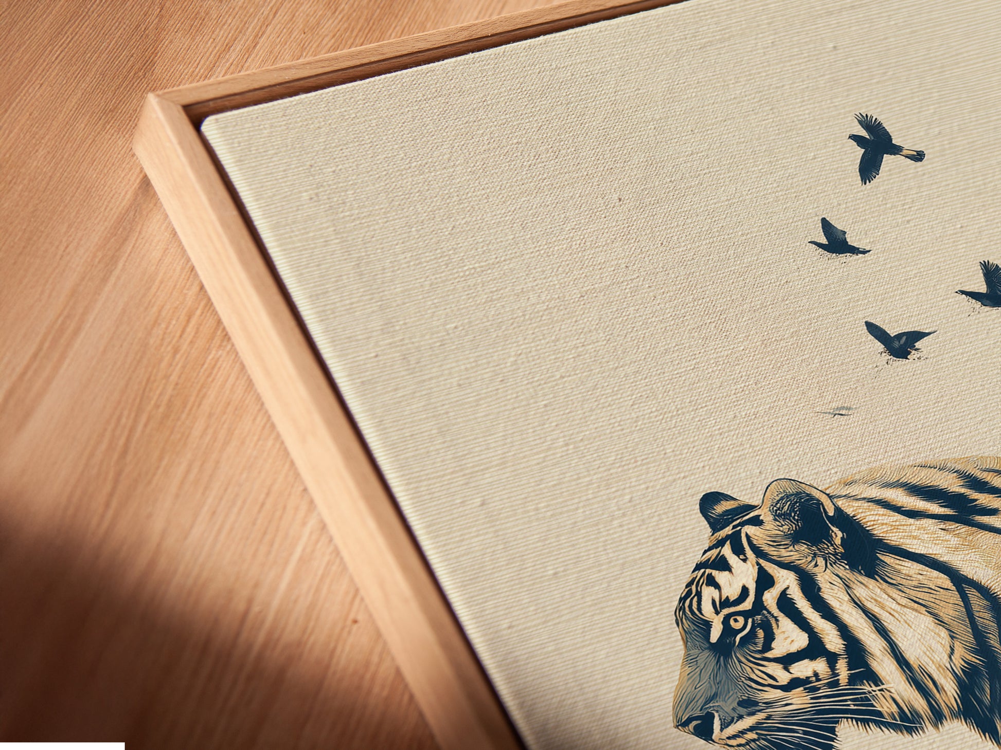A close-up angled view showcases a canvas print in a floating frame. The blue tiger artwork appears to float adding depth. This contemporary piece enhances any space. Perfect for minimalist wall art enthusiasts. Discover the unique appeal of wildlife silhouette art.