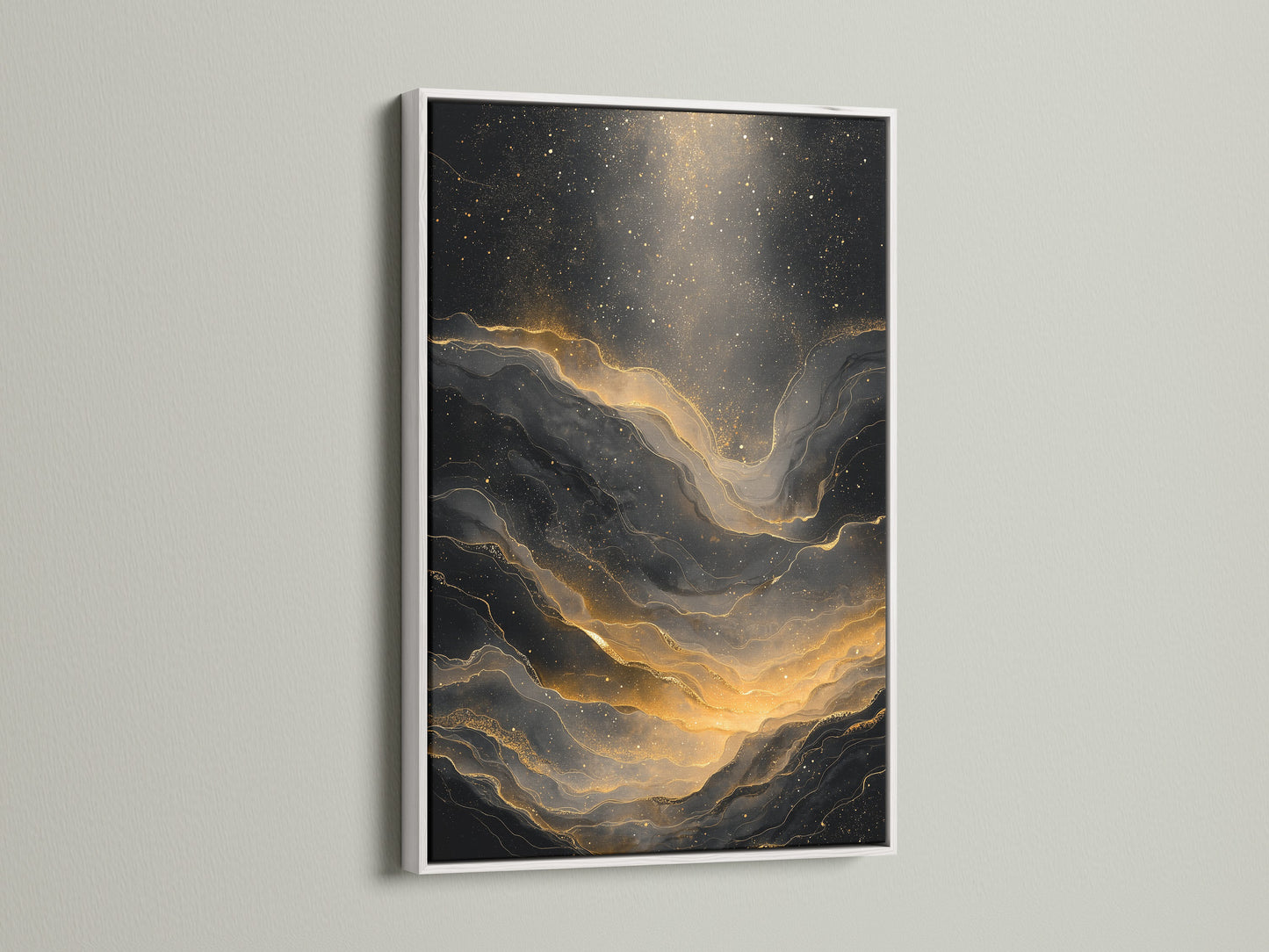 A white frame contains an abstract artwork. The art is black and gold. The contrast of the white frame makes the art pop. This piece adds a modern touch to any space. The abstract art is visually appealing. It is an eye-catching addition to home decor.