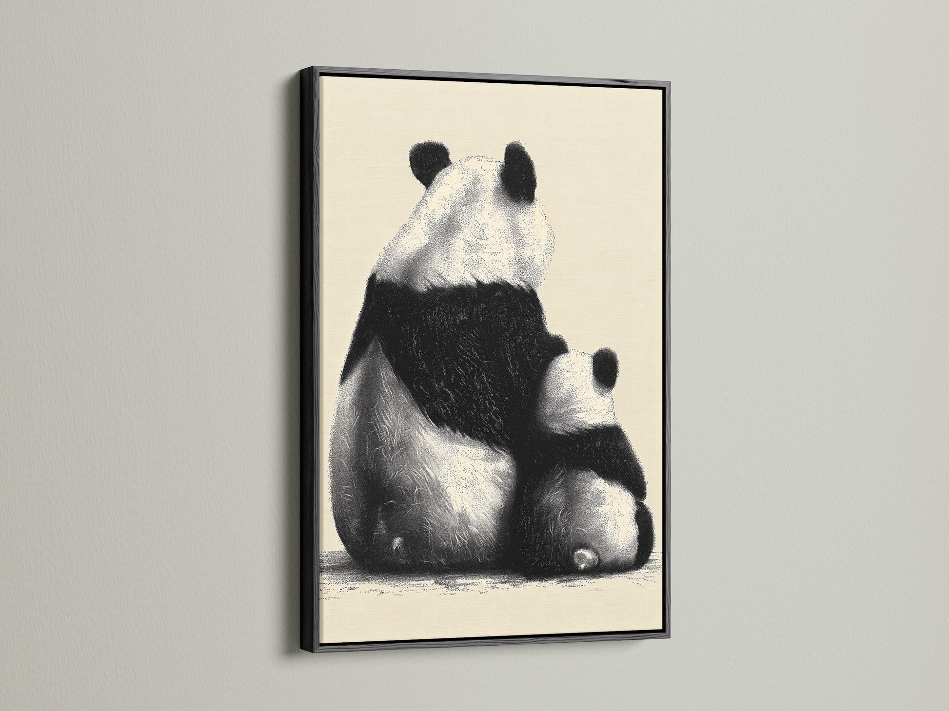 This image features a black frame. The artwork inside highlights a panda and its cub. The black frame provides a bold and classic look. This framed piece will elevate any room's decor with its simple elegance.