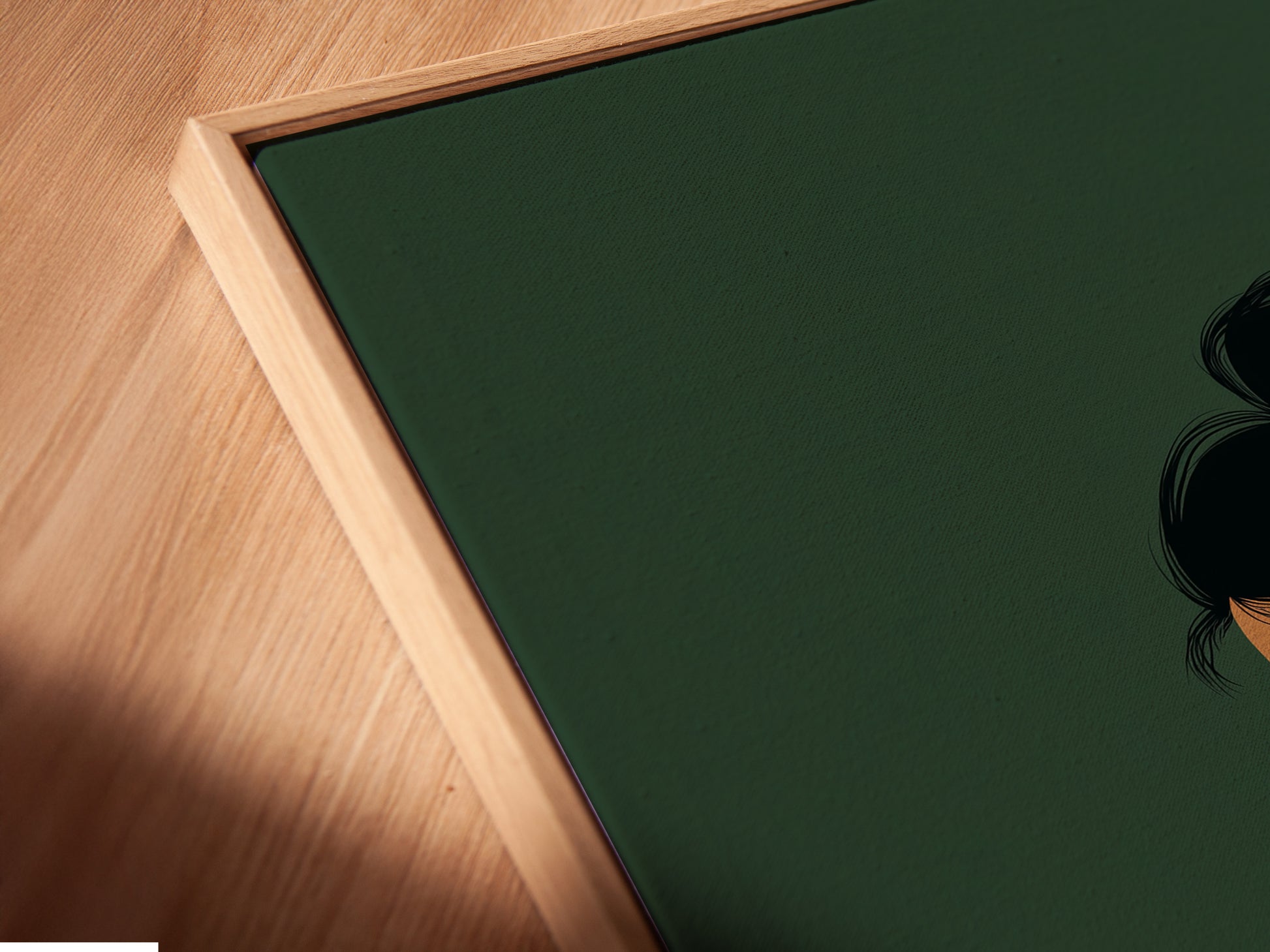 Angled close up of a canvas print in a floating frame. This artwork features a woman reading.  A serene sage green coffee wall art print. Ideal for adding a touch of tranquility to any space.