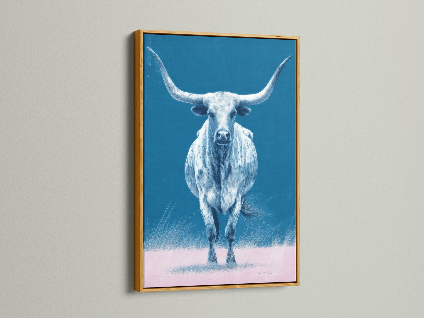 The longhorn bull artwork is featured in a gold frame. This piece of western artwork brings a touch of elegance to your space. The gold frame enhances the blue and pink hues. Perfect for a sophisticated look.
