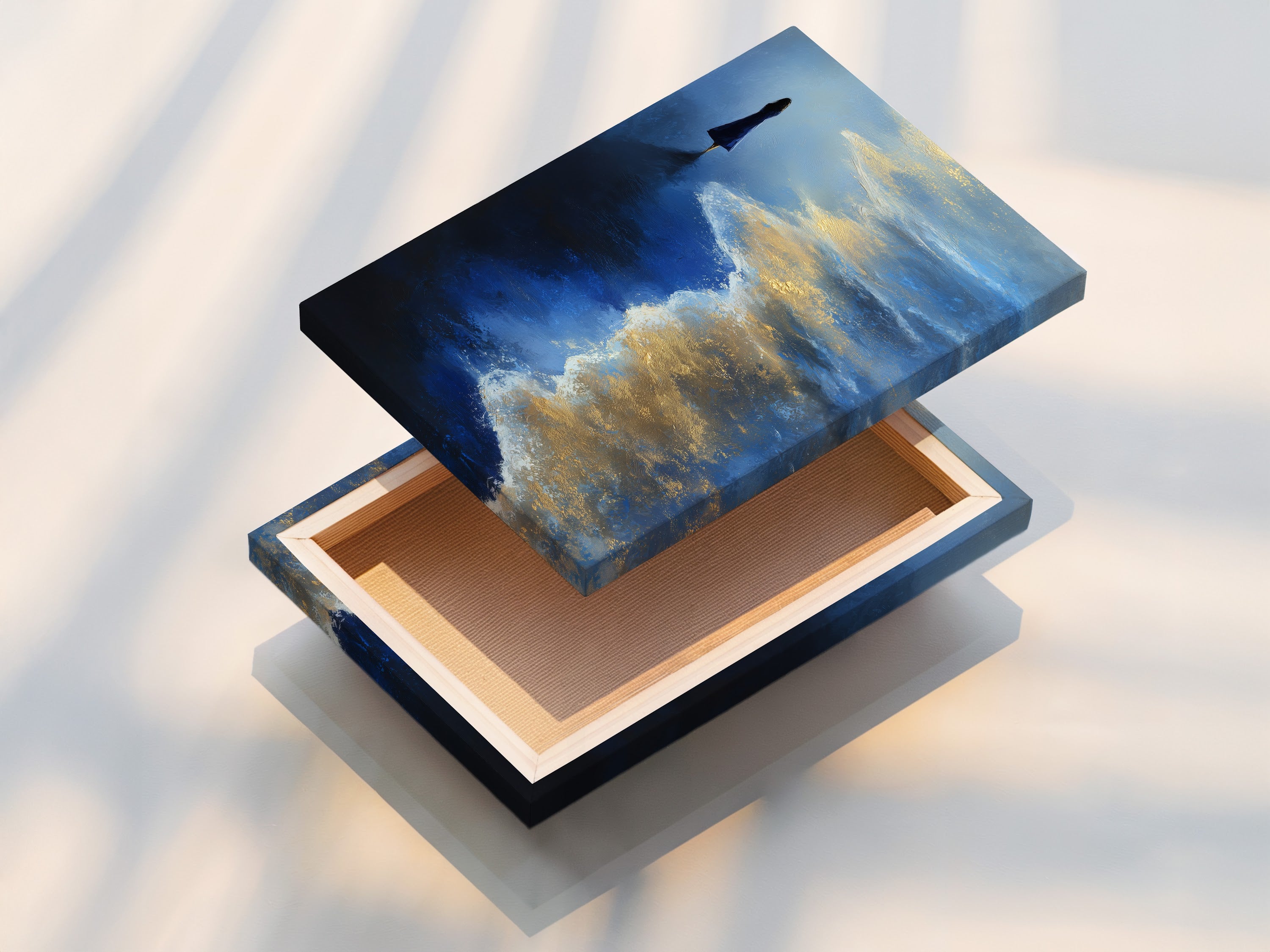 A stretched canvas print of the Ocean Solitude artwork. The blue and gold colors create a stunning visual effect. This seascape canvas is ready to hang. A great addition to any coastal or tropical-themed room.