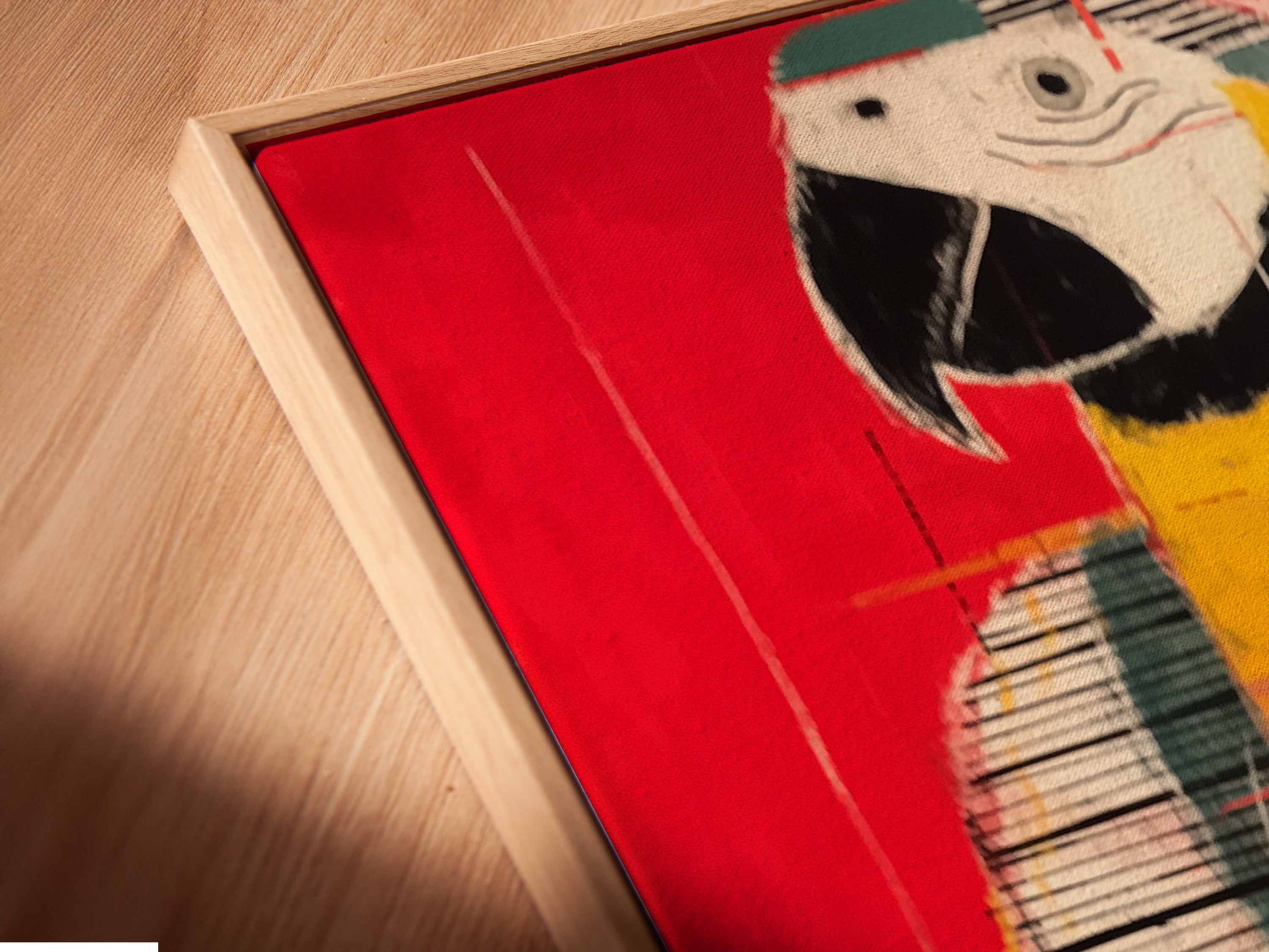 A close-up shot reveals a canvas print in a floating frame. This framing style gives the art depth. The parrot artwork looks stunning and modern. Add dimension to your walls with floating frame canvas prints.