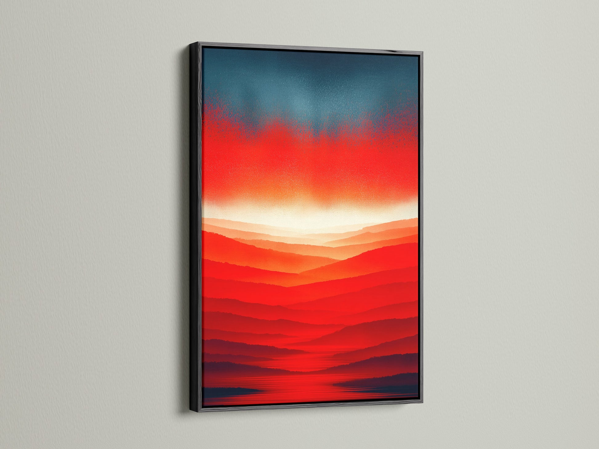 This striking abstract sunset art featuring a red orange mountain landscape is presented in a black frame. The modern canvas print adds sophistication to any space. Warm colors and layered mountains create depth.