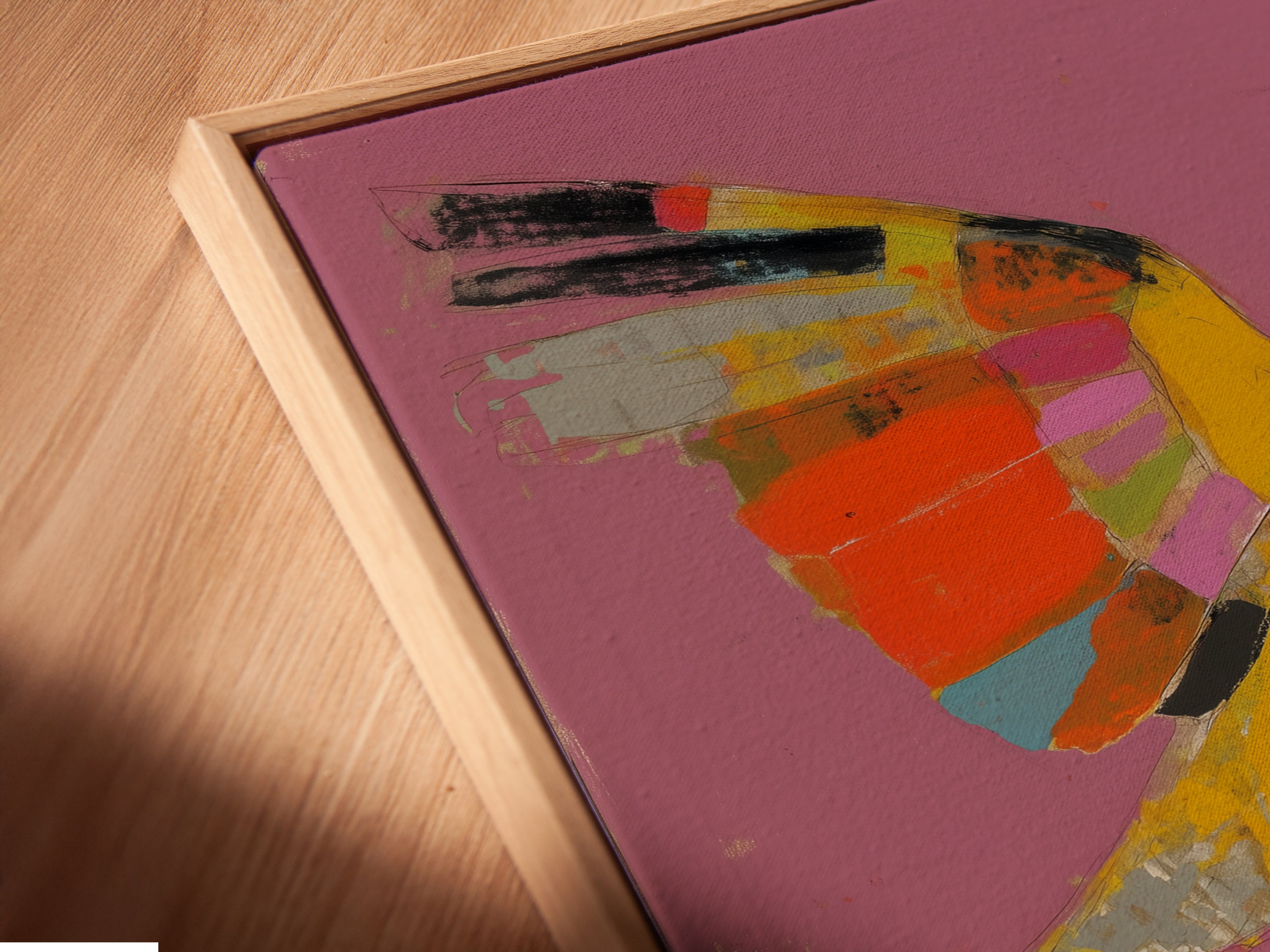 Close-up of a Parrot DJ canvas print. The artwork is set in a floating frame. The frame enhances its contemporary style. This piece brings retro vibes to any room. Great artwork for music lovers.