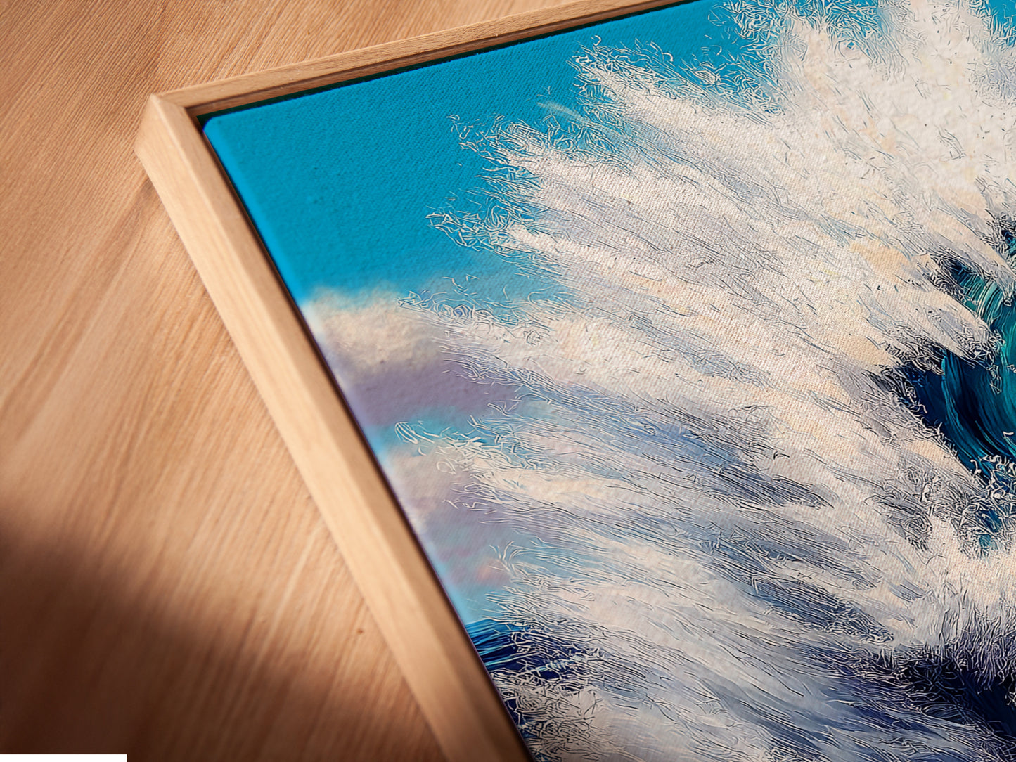 A close-up angled view reveals the canvas print in a floating frame. The ocean wave artwork looks stunning. The teal seascape canvas adds depth to the image. Perfect for enhancing bathroom wall decor. This piece brings a coastal vibe to your space.
