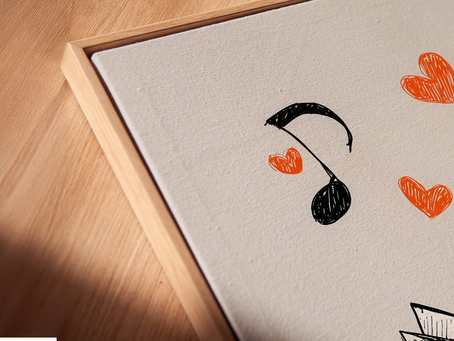 Close-up angled view of a canvas print in a floating frame. The origami cranes artwork is visible. It features two origami cranes on a music sheet background. The floating frame gives a modern touch.