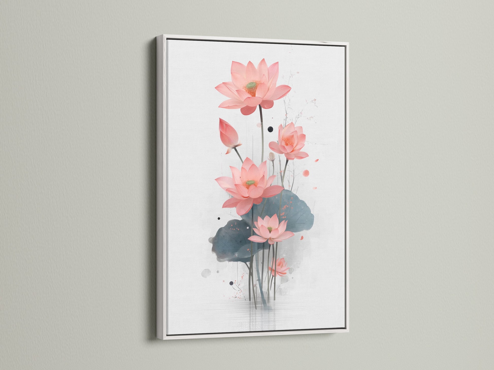 A white frame accentuates the delicate beauty of a lotus flower artwork. This floral canvas print brings a fresh modern touch to your space. Perfect as bedroom art or flower wall art. The white frame complements the pink flowers. Enhance your home with this botanical print.