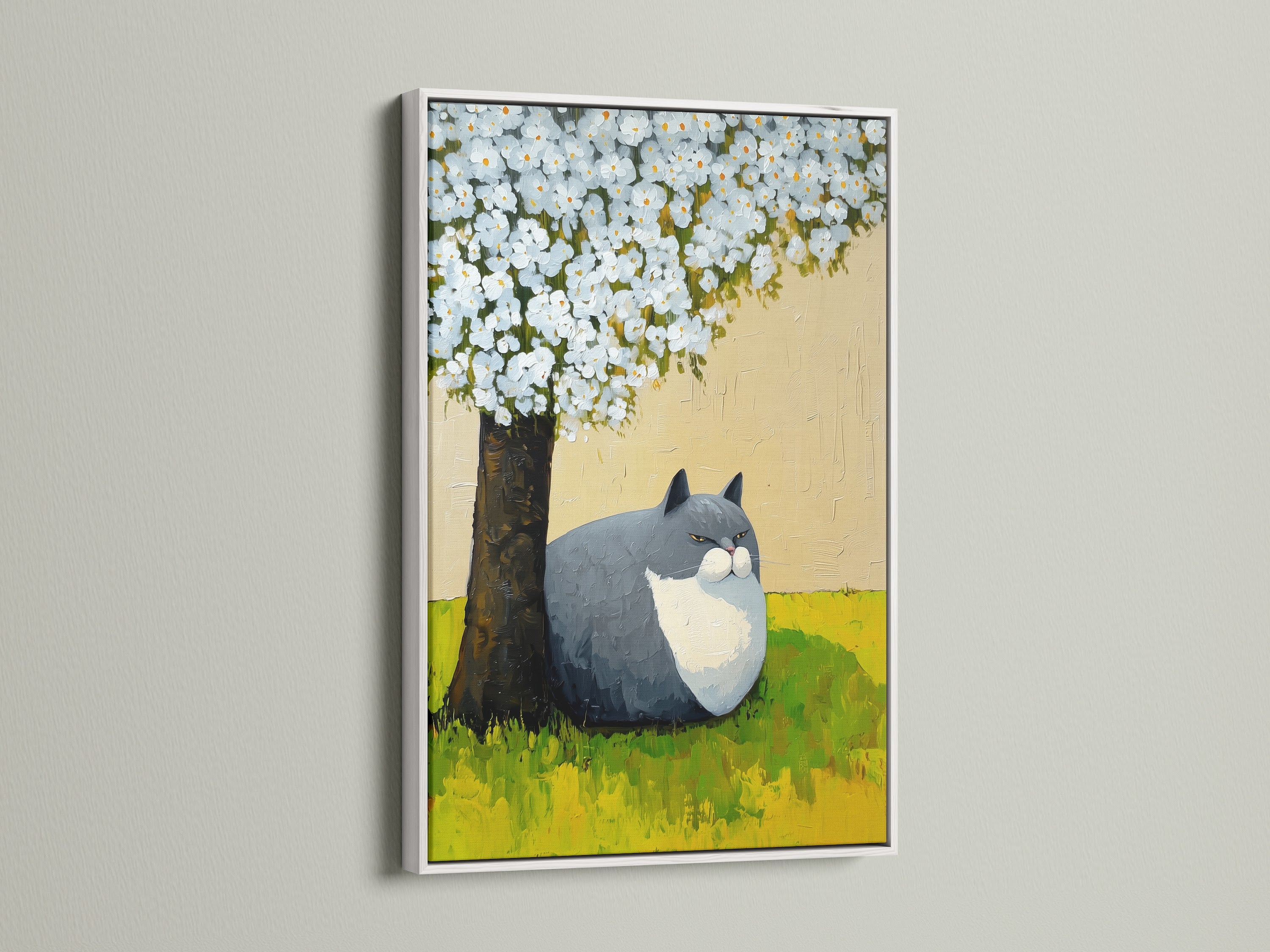The image shows a delightful cat under tree artwork in a white frame. It is a whimsical nursery art suitable for contemporary interiors. This floral animal art adds a fresh spring wall decor touch. It is ideal for homeowners seeking unique animal-themed wall art.