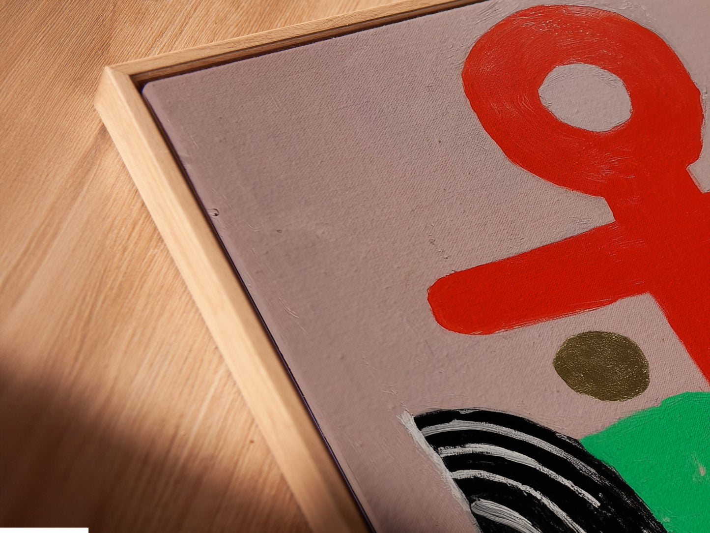 A close-up angled view of a canvas print in a floating frame. The Abstract Anchor art is visible. The artwork's modern design enhances any space. The floating frame adds a contemporary touch to this nautical print.