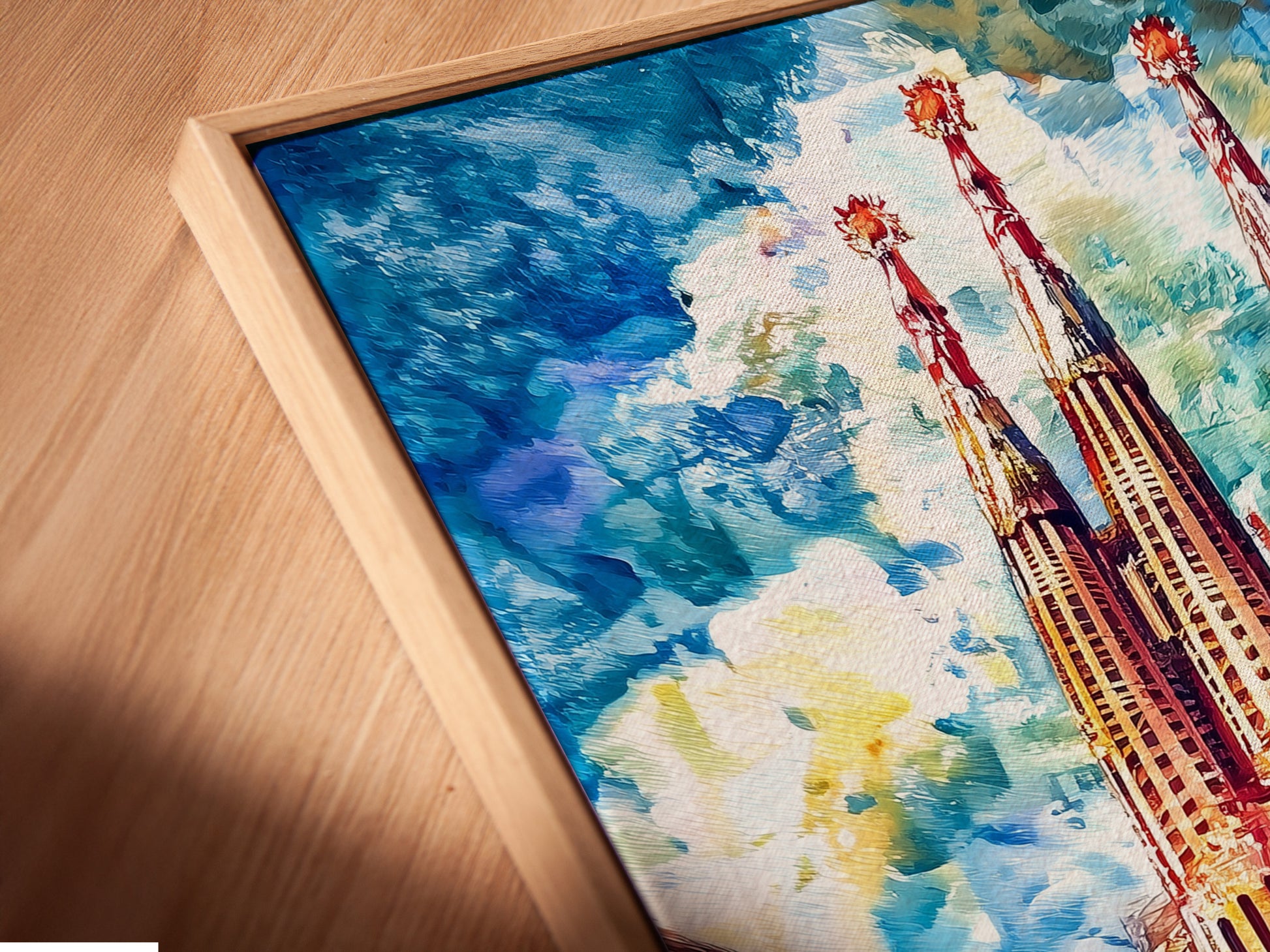 Close-up of a Sagrada Familia canvas print in a floating frame. The Barcelona wall art is a stunning gothic cathedral poster. It is ready to hang. Perfect for adding architectural artwork to your home or office wall decor.
