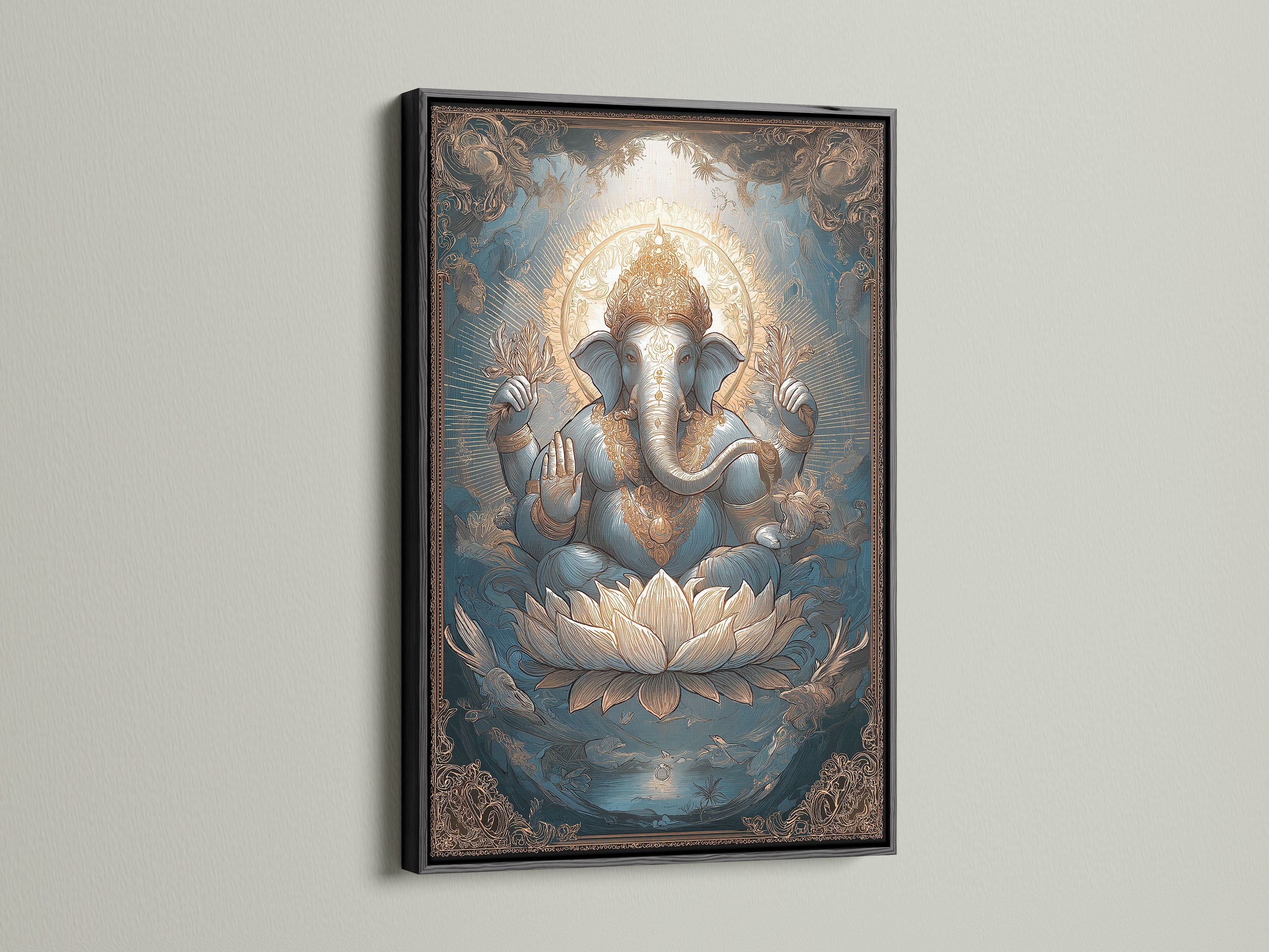Ganesha Canvas Art in a black frame. This Hindu deity print is a great addition to any space. The Elephant God art is perfect for yoga studio decor. The Lotus art print brings spiritual decor.