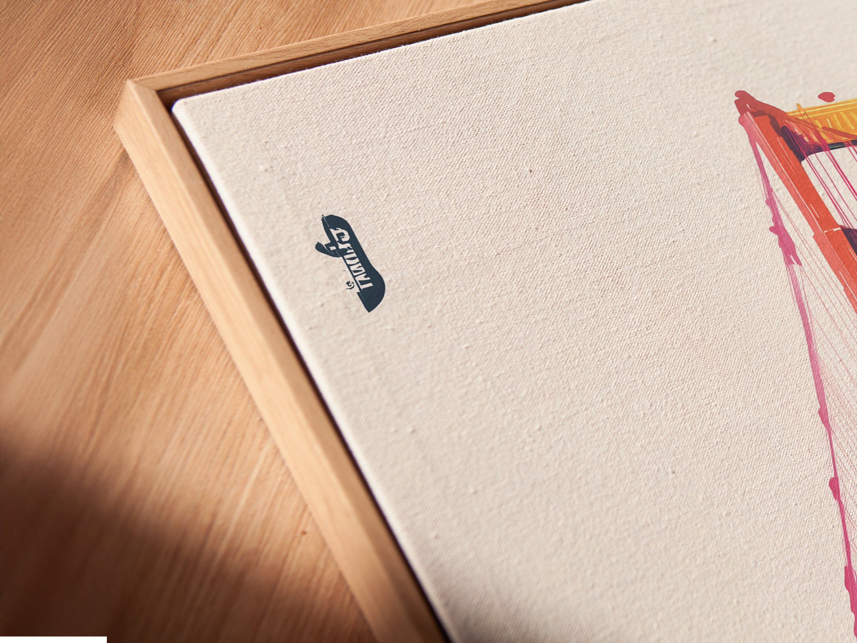 Angled close-up of a canvas print in a floating frame. The frame creates a unique shadow effect. This modern framing style adds depth. It enhances the Golden Gate Bridge art. Perfect for a contemporary look.