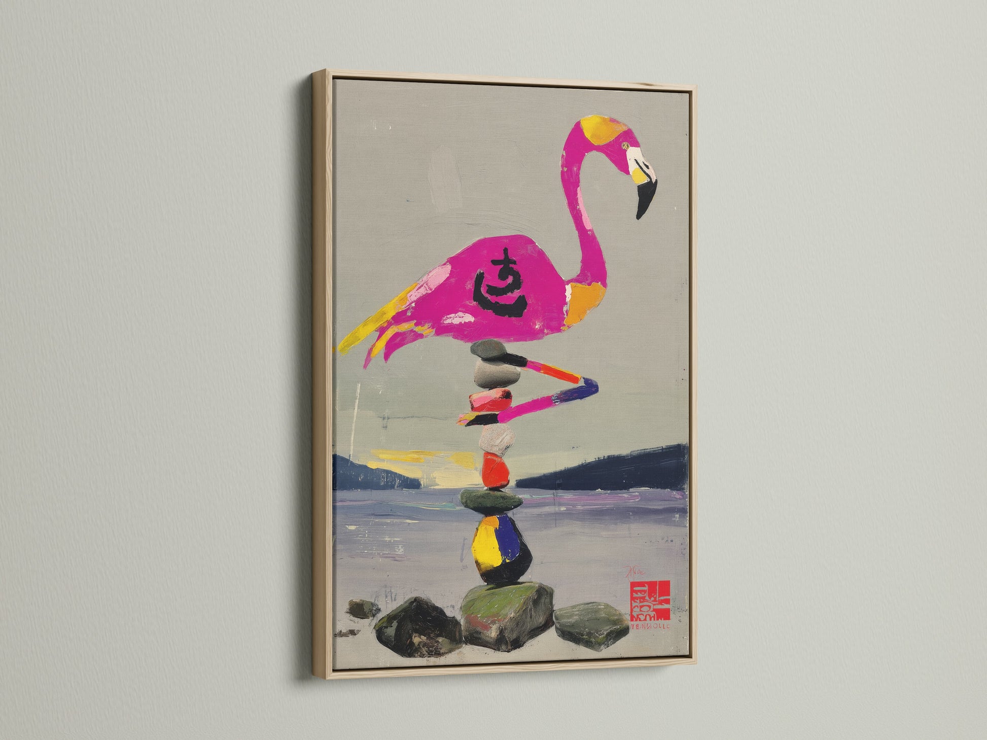 A zen stone stack canvas wall art piece is framed in a natural oak finish. The artwork features a flamingo balancing on rocks. This frame enhances the art's tropical aesthetic. It brings a sense of balance and mindfulness.