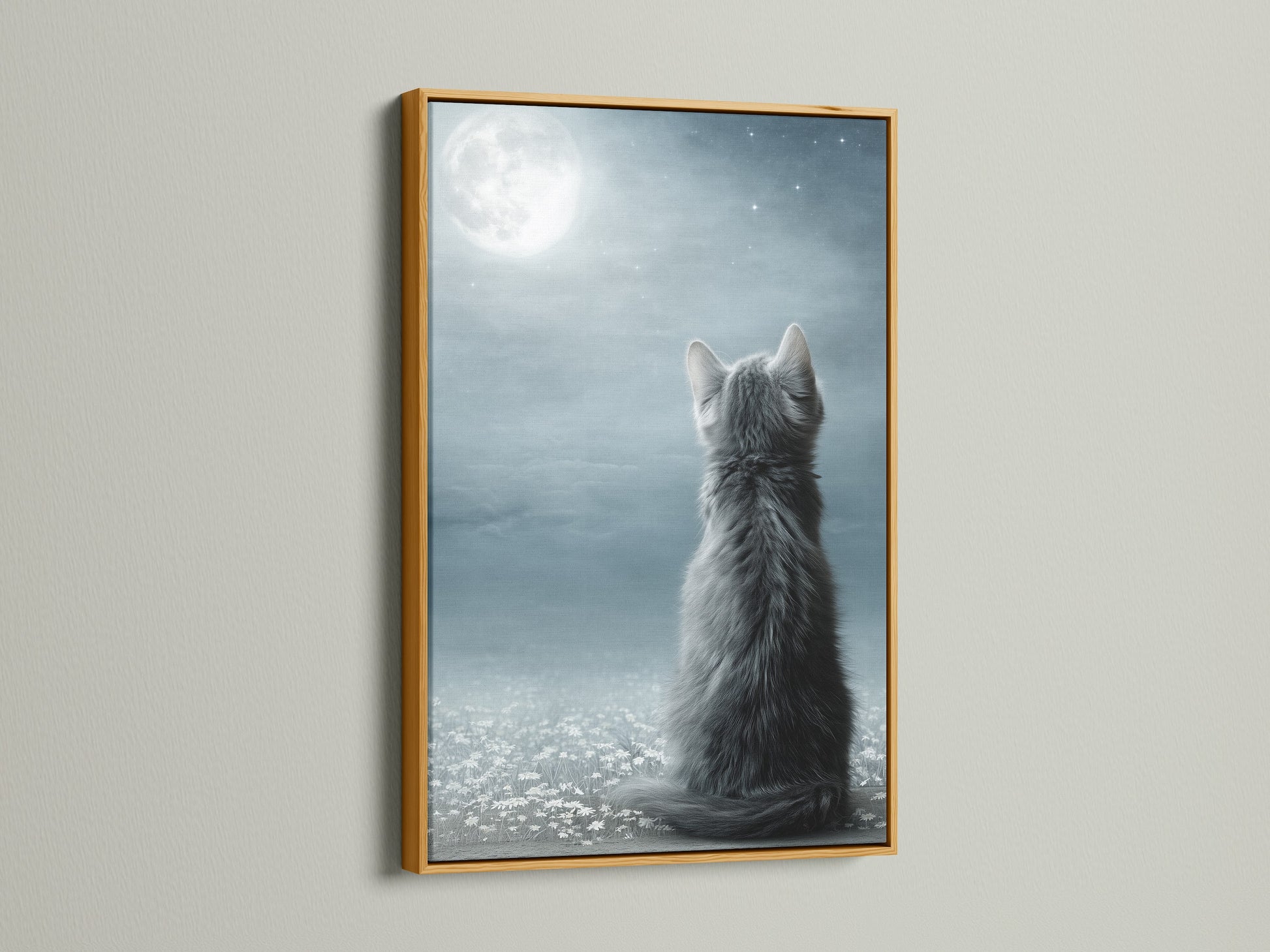 The Cat Moon Canvas Print is featured in a gold frame. The gold frame adds a touch of luxury to the celestial kitten artwork. This whimsical art is perfect for adding a dreamy touch. This wall art is ideal for a nursery or living room. It makes a perfect pet lover gift.
