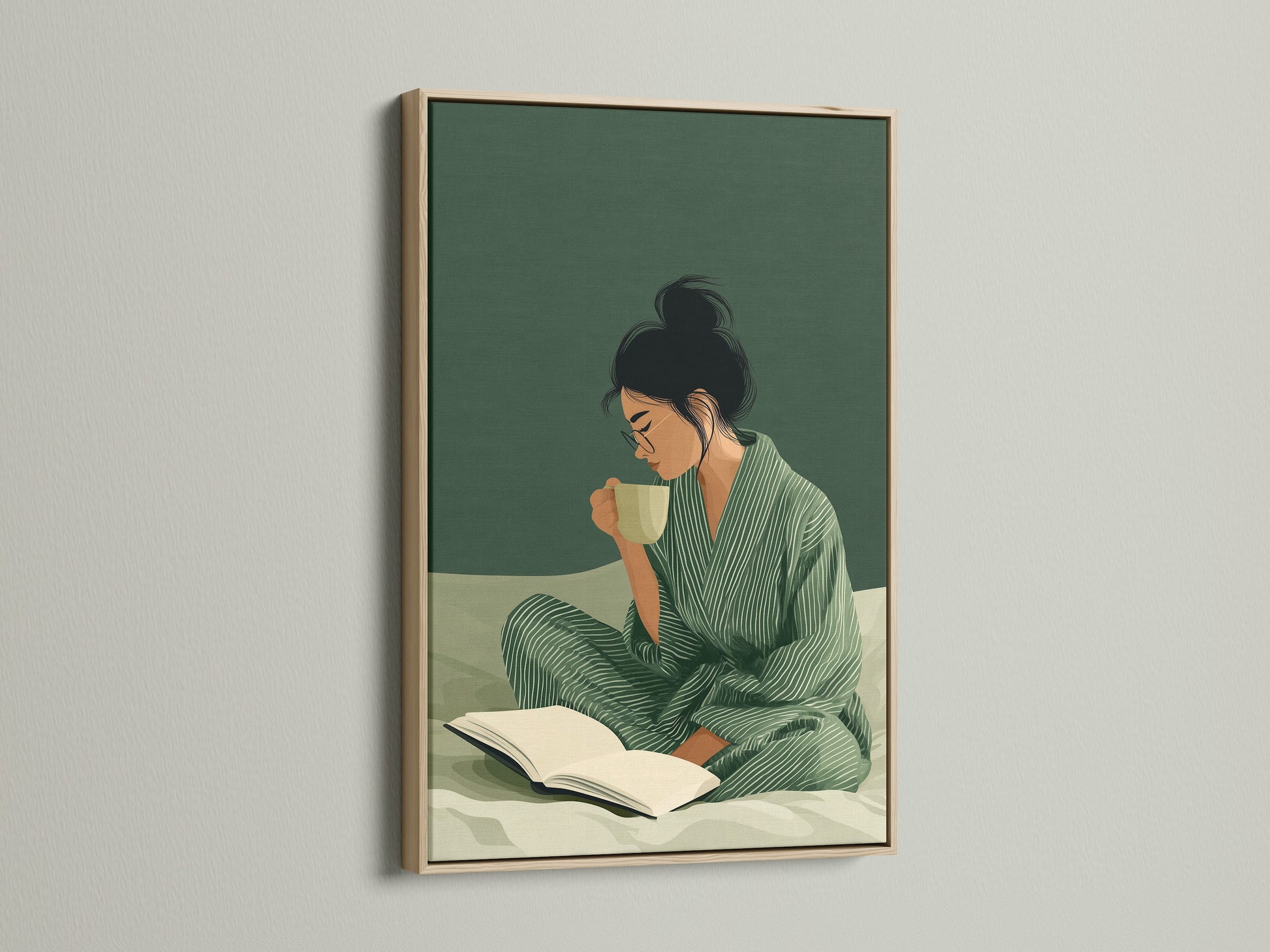 Woman Reading Art Print with an oak frame.  Enhance your space with this sage green wall art. This piece adds a touch of serenity to any room. Ideal for cozy home art.