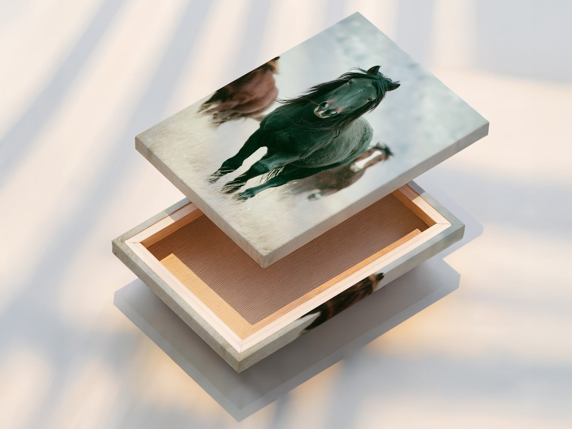 A stretched canvas print of wild horses is displayed. This Western animal wall art is ready to hang. It adds rustic charm to any space. Perfect for living rooms bedrooms or offices seeking a country or farmhouse style. This artwork is great for ranchers or anyone that appreciates wildlife art. This durable canvas brings the beauty of wildlife indoors.