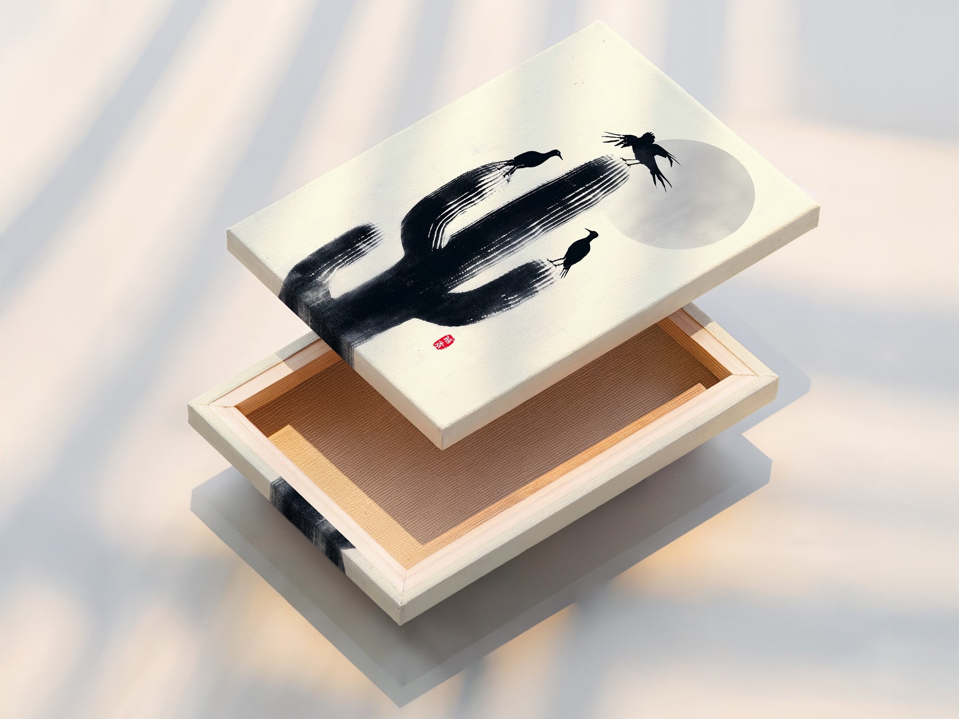 Close-up of a stretched Cactus Birds canvas print. Black birds sit on a cactus in this desert silhouette artwork. A minimalist monochrome print perfect for southwestern decor. Enhance your living space with nature.