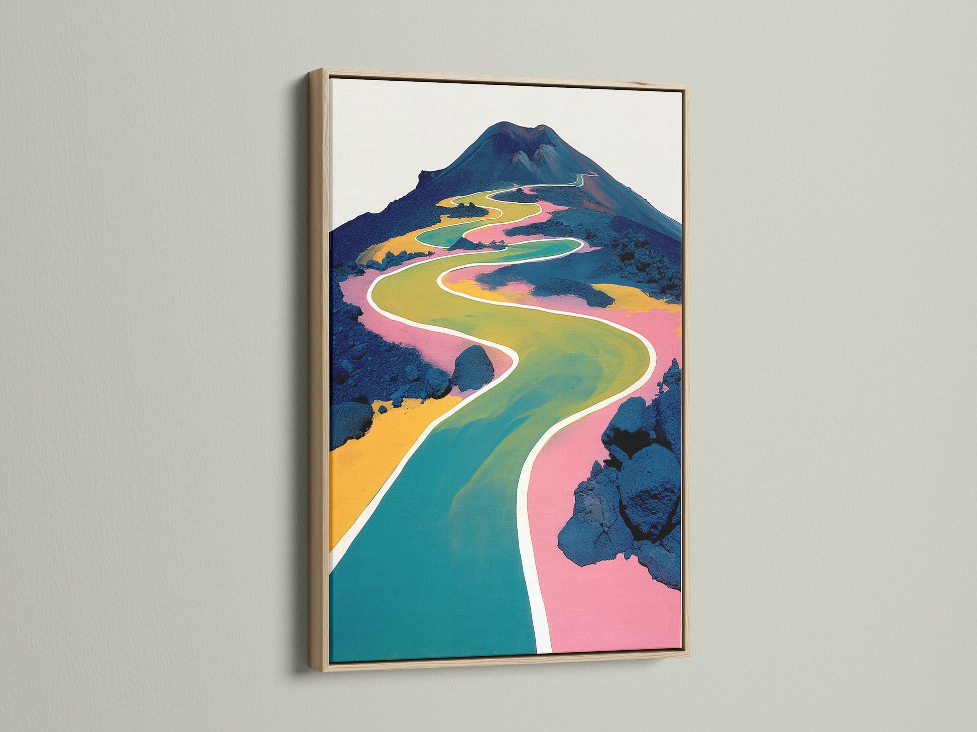Abstract mountain landscape canvas art in an oak frame. The vibrant artwork showcases a colorful winding path. This is modern nature art for your home or office wall decor.