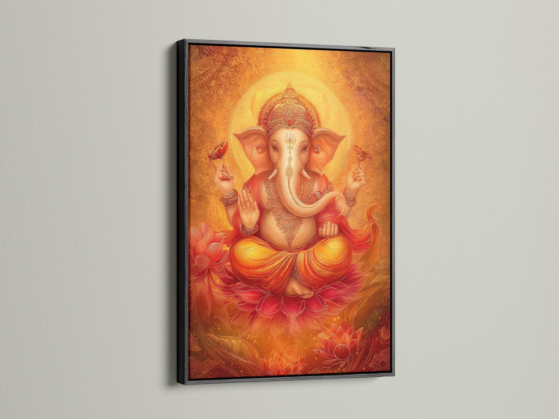Ganesha Print in a black frame. This Hindu God canvas art features a golden orange design. It is spiritual art perfect for a meditation room. It also enhances a yoga studio. Ideal for bohemian eclectic and modern decor.