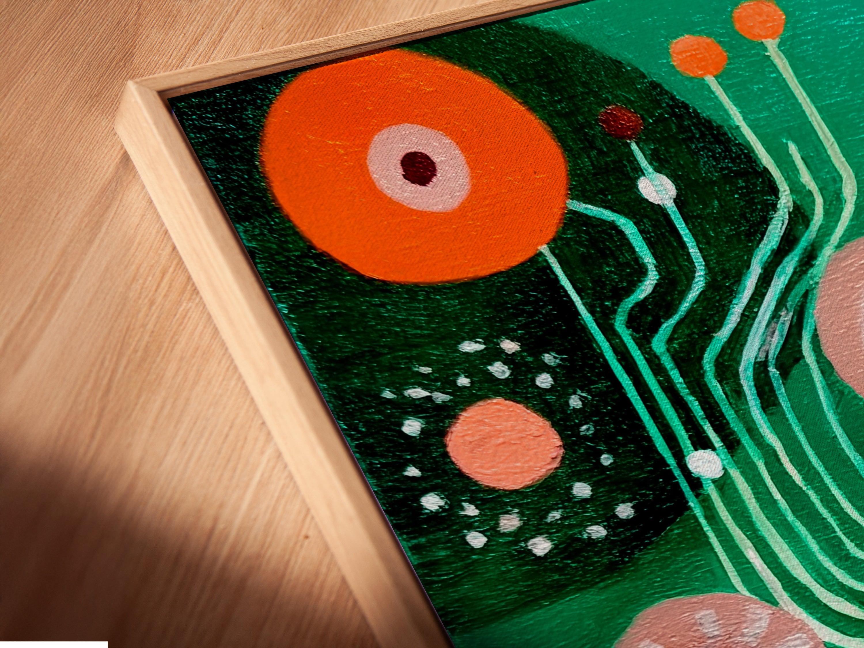 A close-up angle reveals a canvas print in a floating frame. The modern abstract art showcases retro geometric patterns. The colorful mid-century print enhances any space. This artwork is perfect for adding depth to office decor. Great contemporary art.