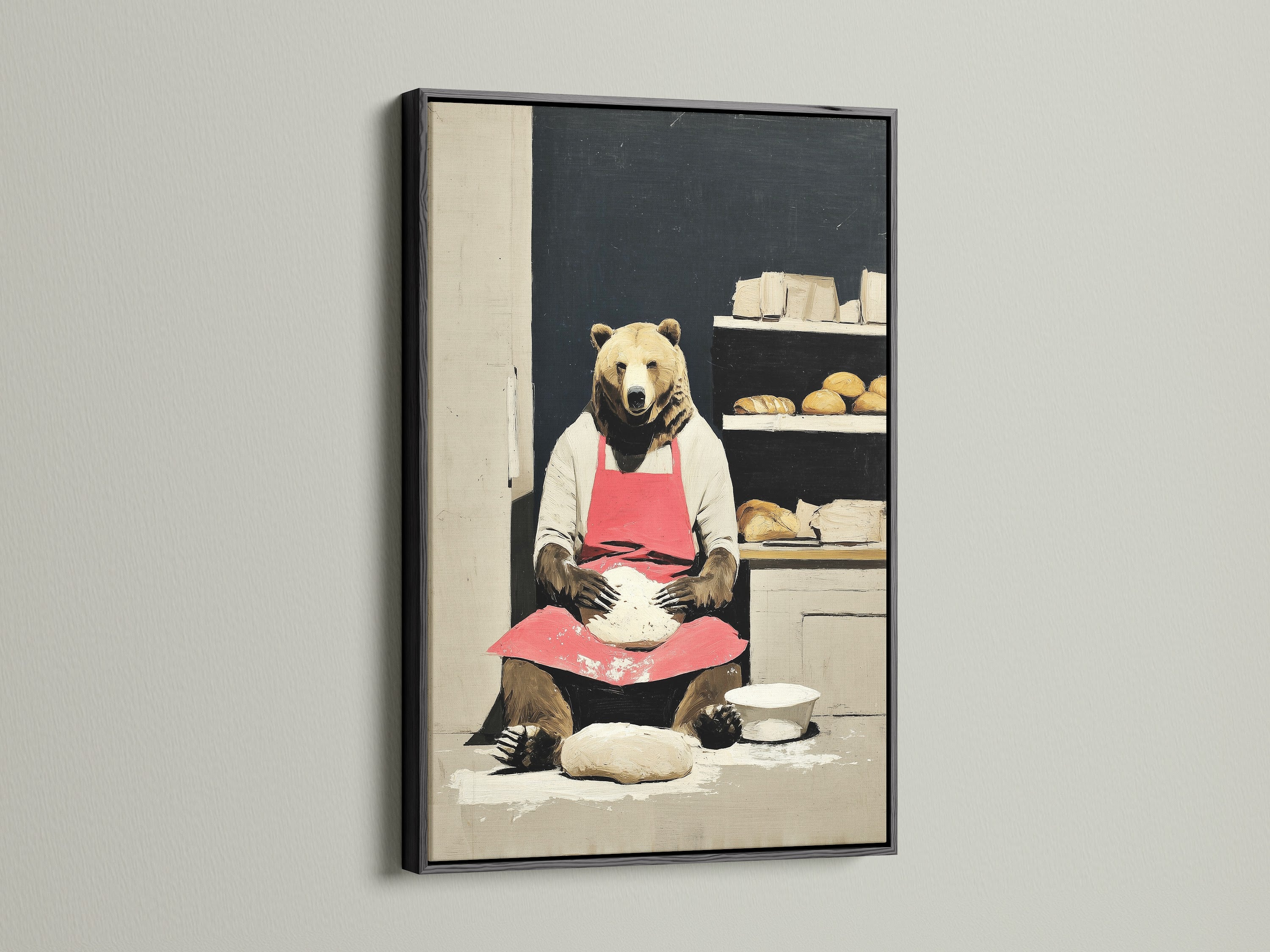 The adorable bear baker artwork is presented in a sleek black frame. The black frame provides a bold and contemporary feel. It is perfect for kitchens and cafes. This artwork adds a touch of playful sophistication to any setting.