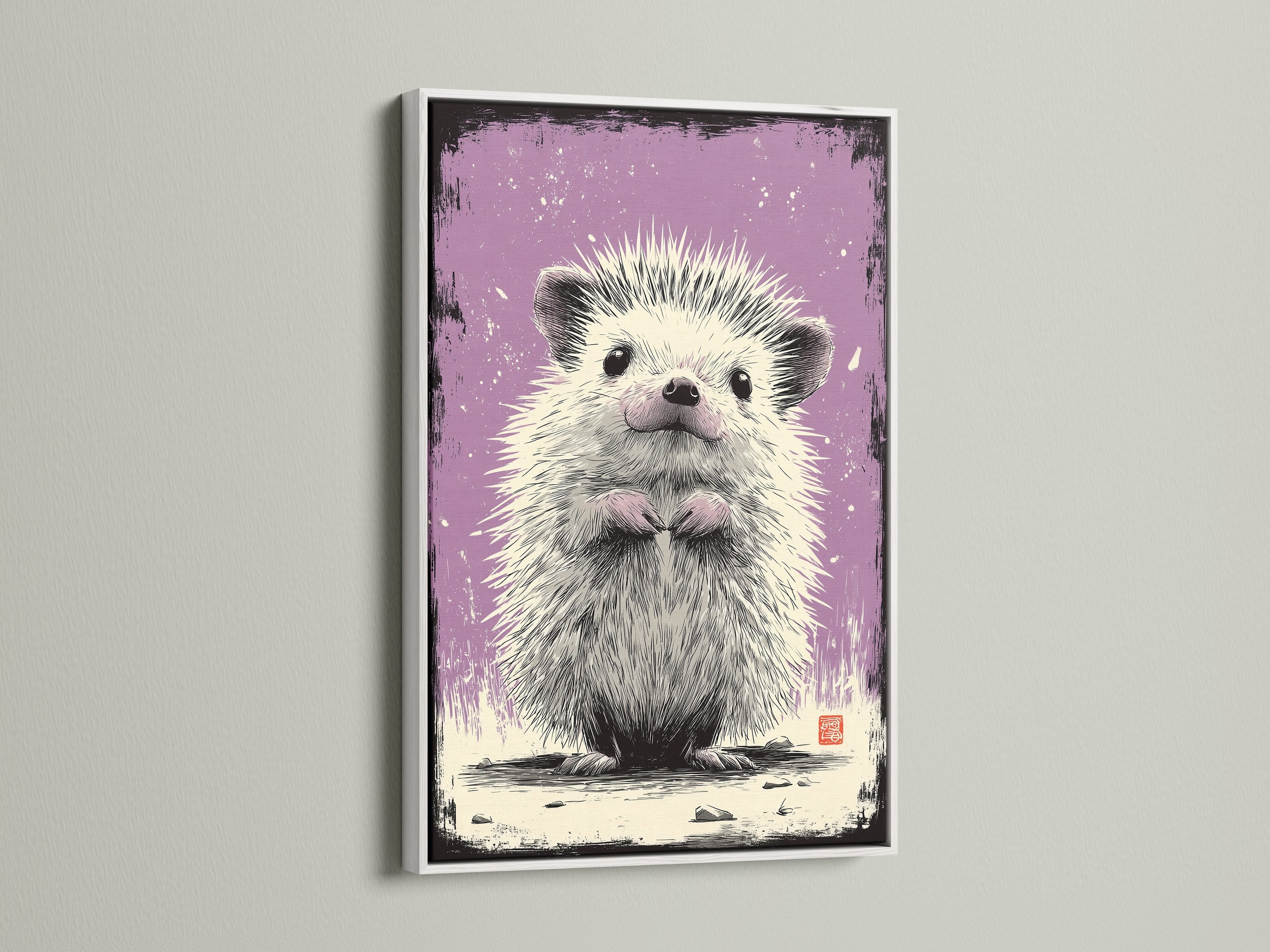 A cute hedgehog artwork is framed in white. The white frame offers a clean look. It makes the artwork pop. This framed piece suits modern interiors. Consider this framed artwork for a fresh touch. The art adds personality to any room.