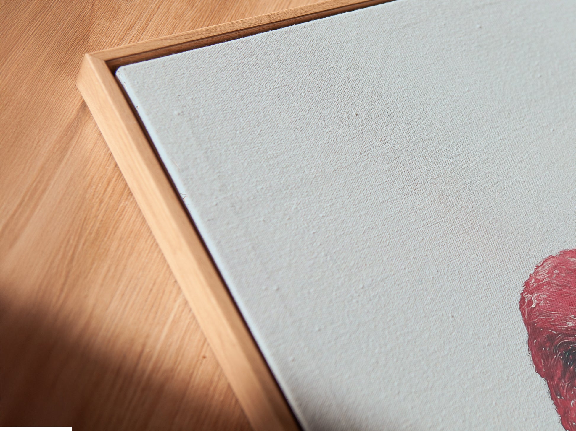 A close-up of a canvas print in a floating frame. The flamingo artwork enhances any interior. Discover how this art elevates spaces.