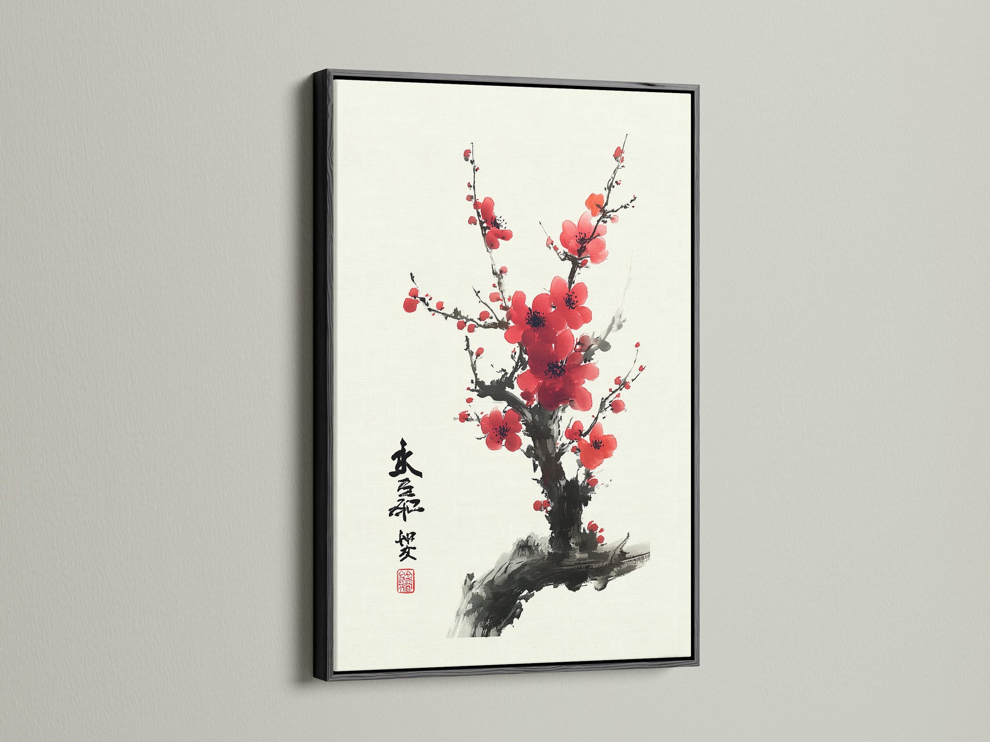 Artwork with a black frame is showcased. The black frame provides a bold and sophisticated contrast. It makes the artwork stand out elegantly. The art is displayed against a white wall. A beautiful cherry blossom artwork is within the frame.