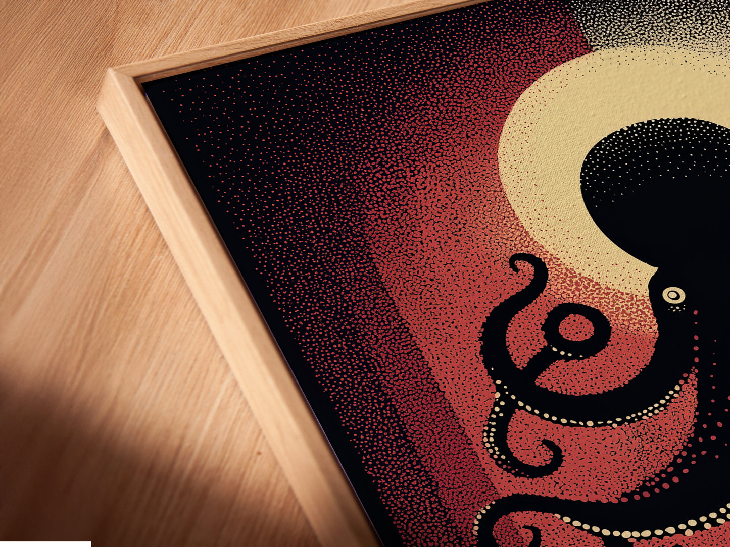 A close-up of a canvas print in a floating frame. The floating frame enhances the octopus artwork. The nautical wall art appears to float. It adds a modern touch to coastal decor. The sea creature print looks stunning and unique.