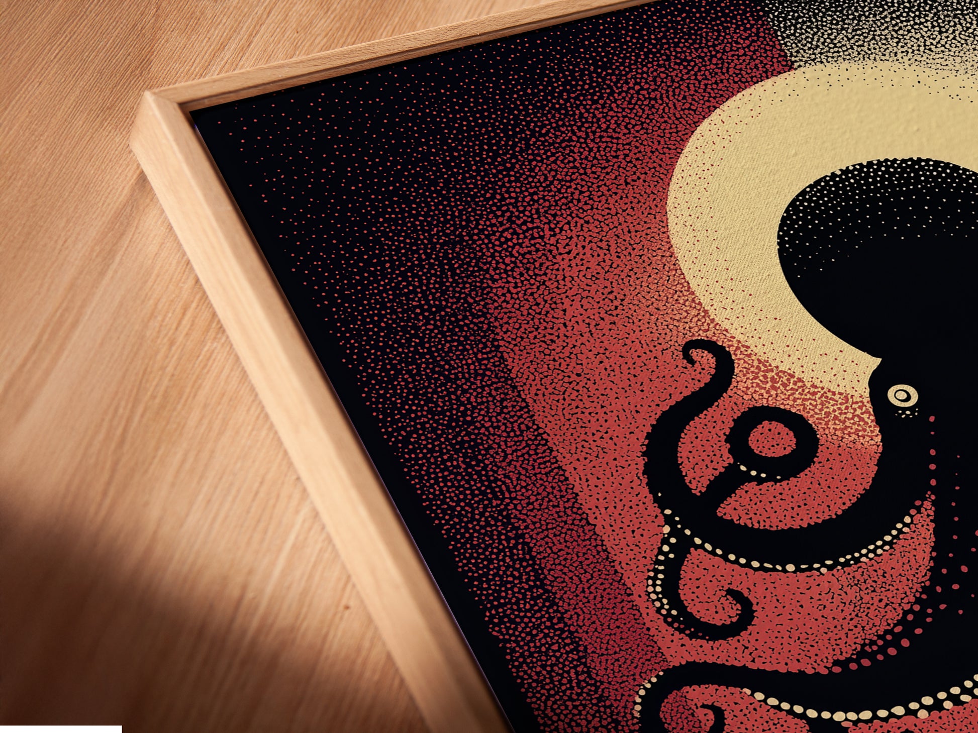 A close-up of a canvas print in a floating frame. The floating frame enhances the octopus artwork. The nautical wall art appears to float. It adds a modern touch to coastal decor. The sea creature print looks stunning and unique.