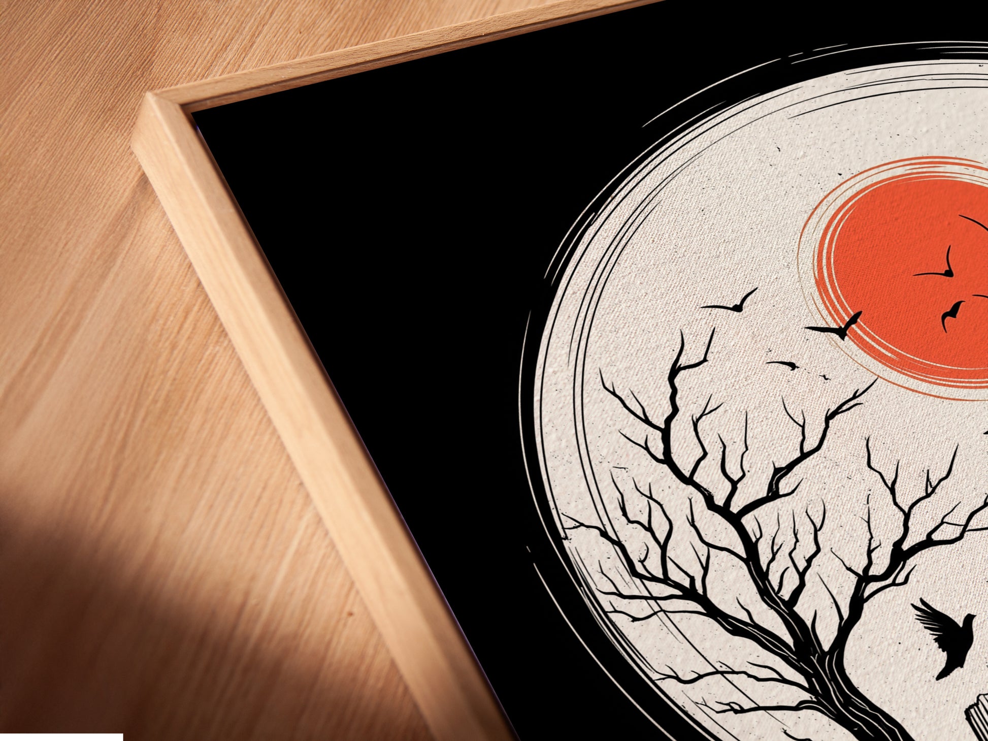 Here is an angled close-up of a canvas print in a floating frame. The artwork showcases a spooky cemetery. It is part of our gothic Halloween collection. Consider this creepy artwork for your fall season decor.