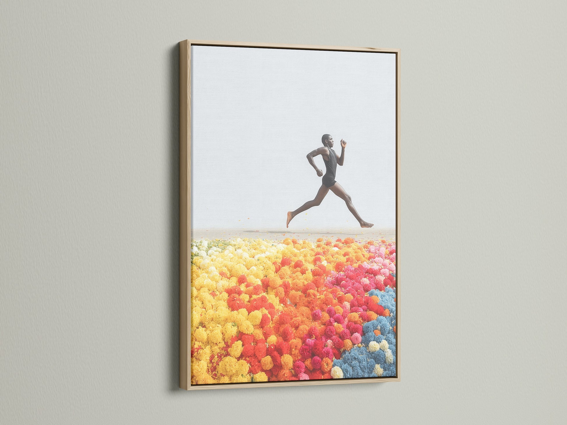 This is a Runner Canvas Print showcased in an oak frame. The artwork captures an energetic pose. It's perfect for adding a touch of modern fine art to any space. Explore our vibrant colors and fitness art options.
