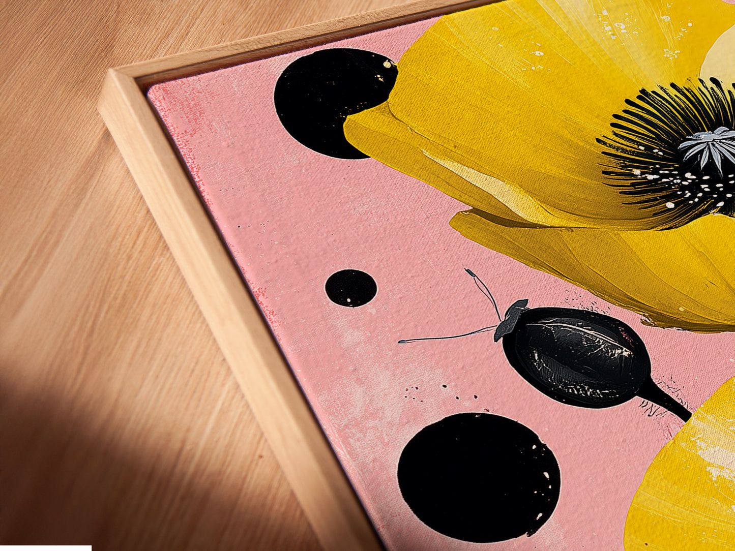 A close-up view of a canvas print in a floating frame. The Yellow Poppy artwork is beautifully showcased. This floral wall art enhances bedroom wall decor with a modern botanical touch. The floating frame adds depth.