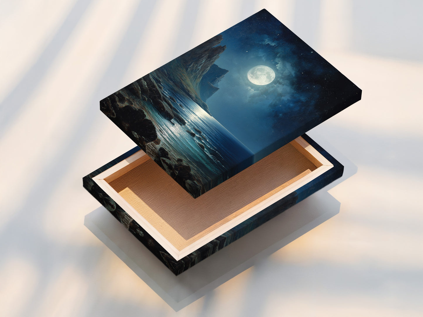 This is a stretched canvas print featuring a beautiful moonlit seascape. The canvas texture enhances the artwork's visual appeal. The stretched canvas is ready to hang and enjoy in your home. This artwork brings a touch of nature and tranquility to any room.